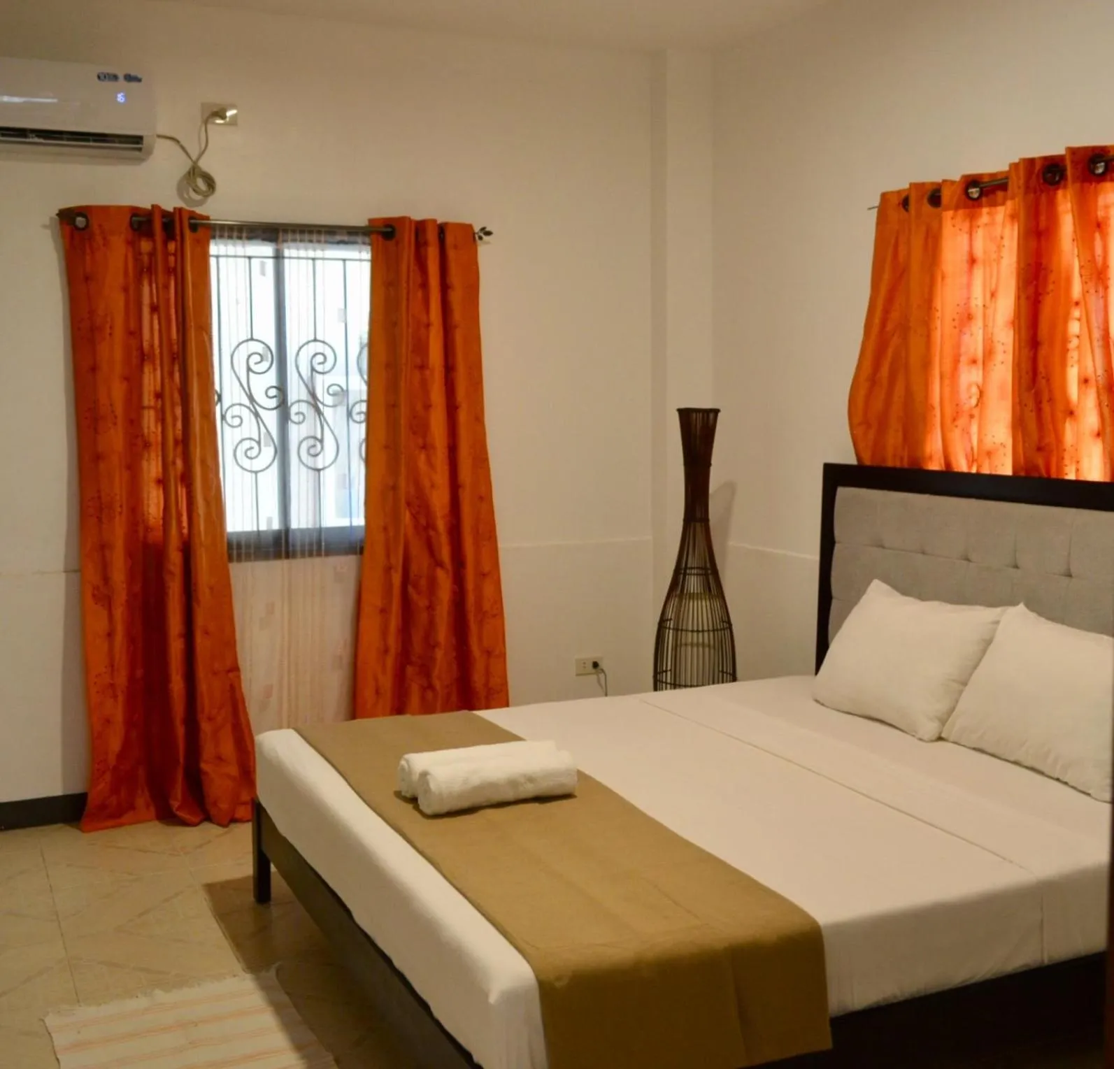 Bed in CHIISAI NATSU RESORT