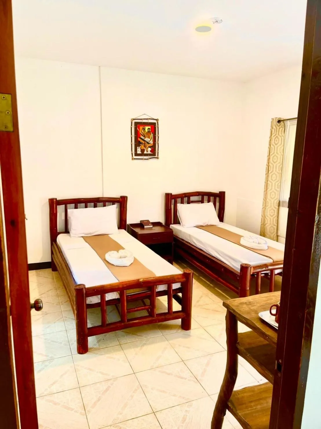 Bed in CHIISAI NATSU RESORT