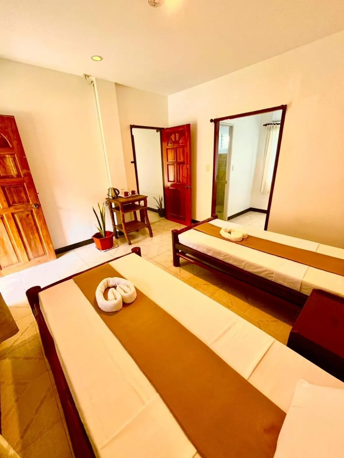 Bed in CHIISAI NATSU RESORT