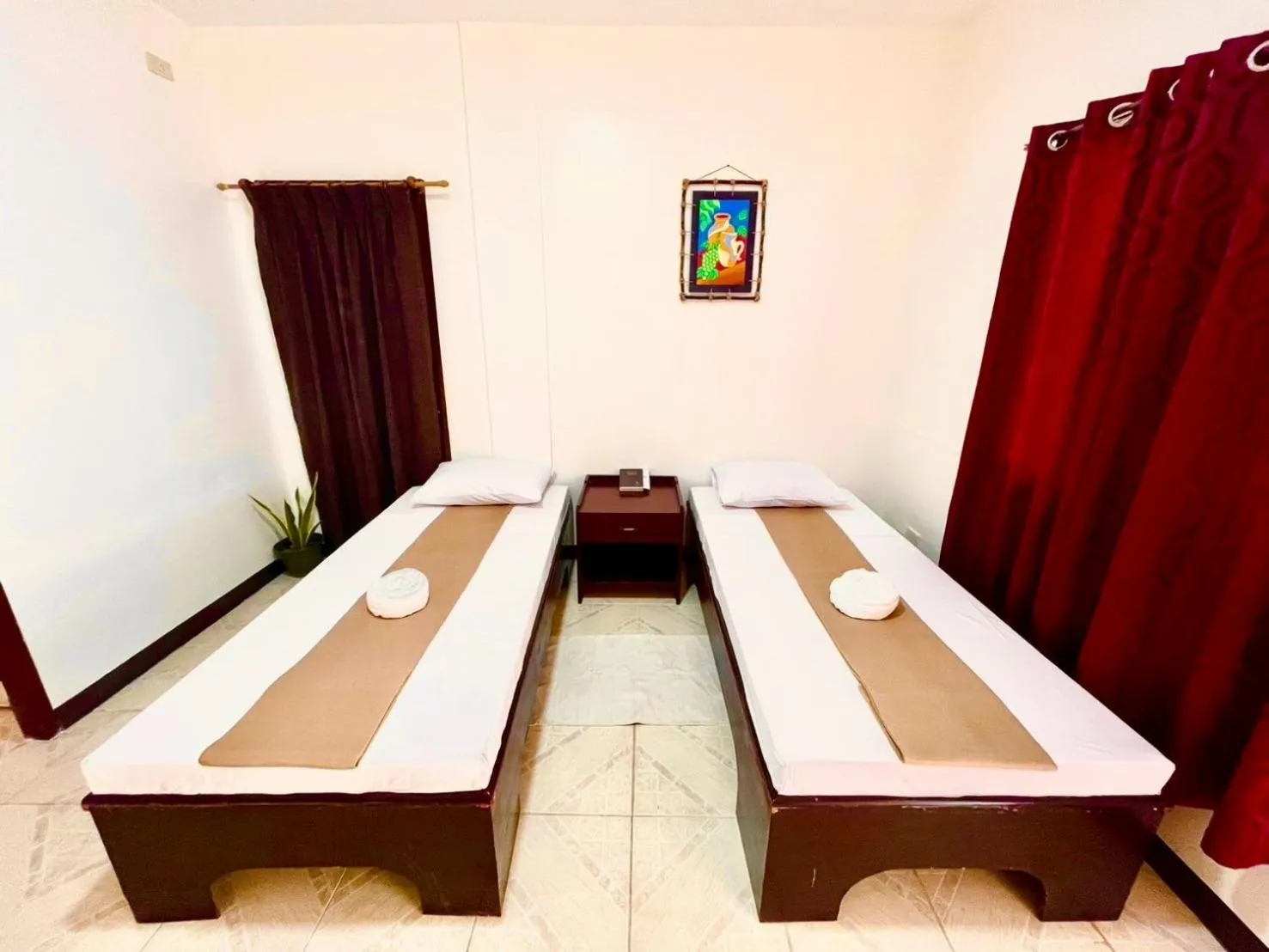 Bed in CHIISAI NATSU RESORT