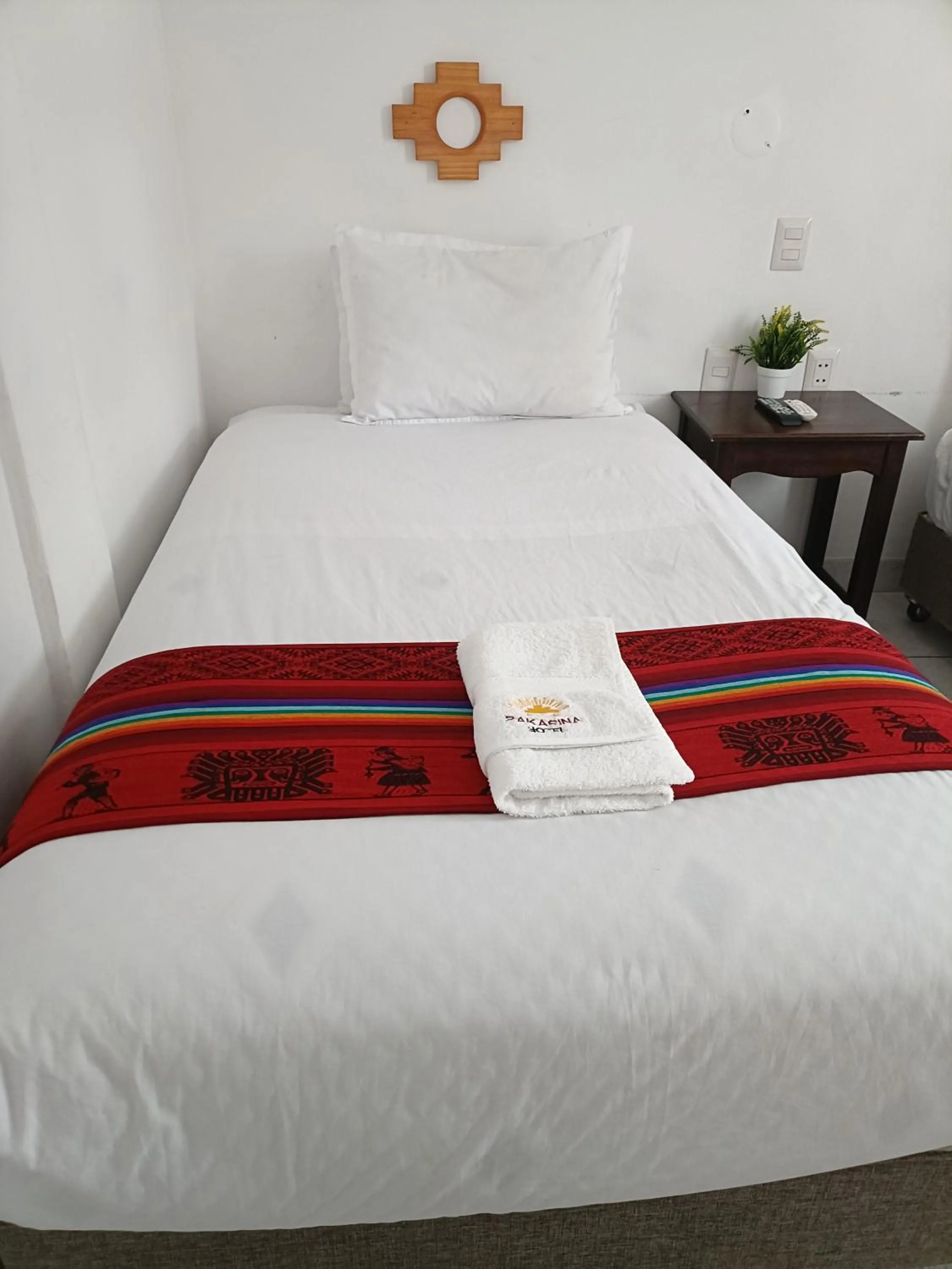Bed in PAKARINA HOTEL