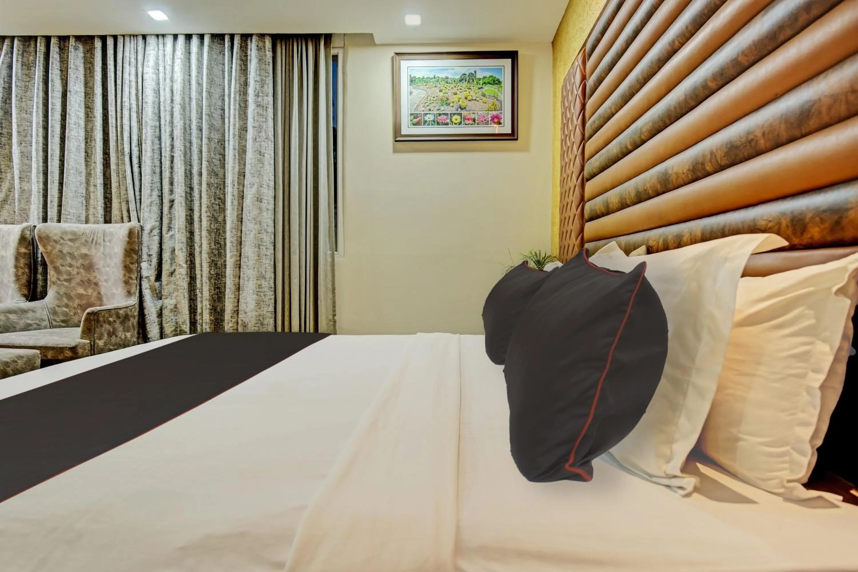 Bedroom, Bed in Super Townhouse Eastern View Formerly Vihaan Residency