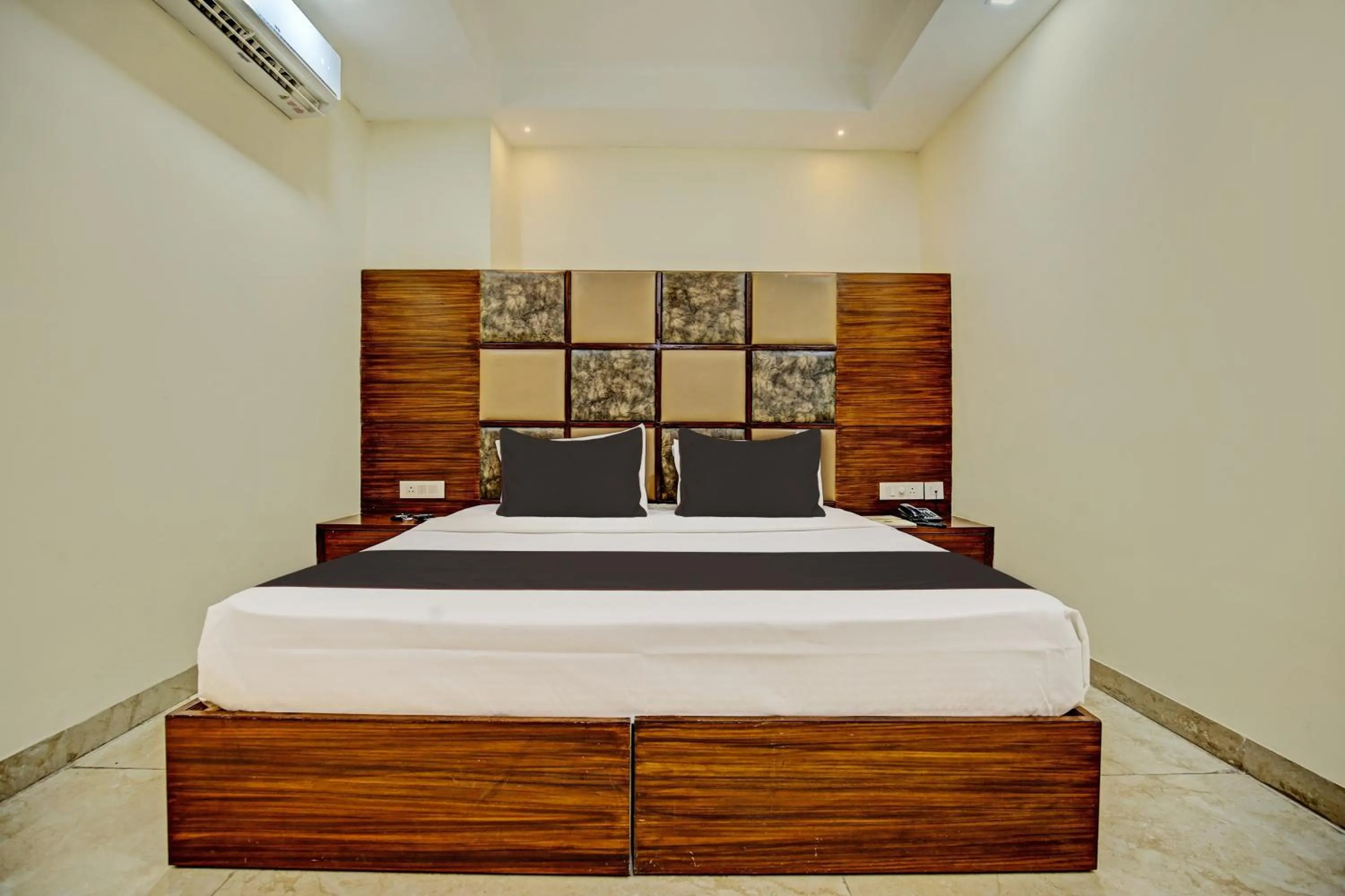 Bedroom, Bed in Super Townhouse Eastern View Formerly Vihaan Residency