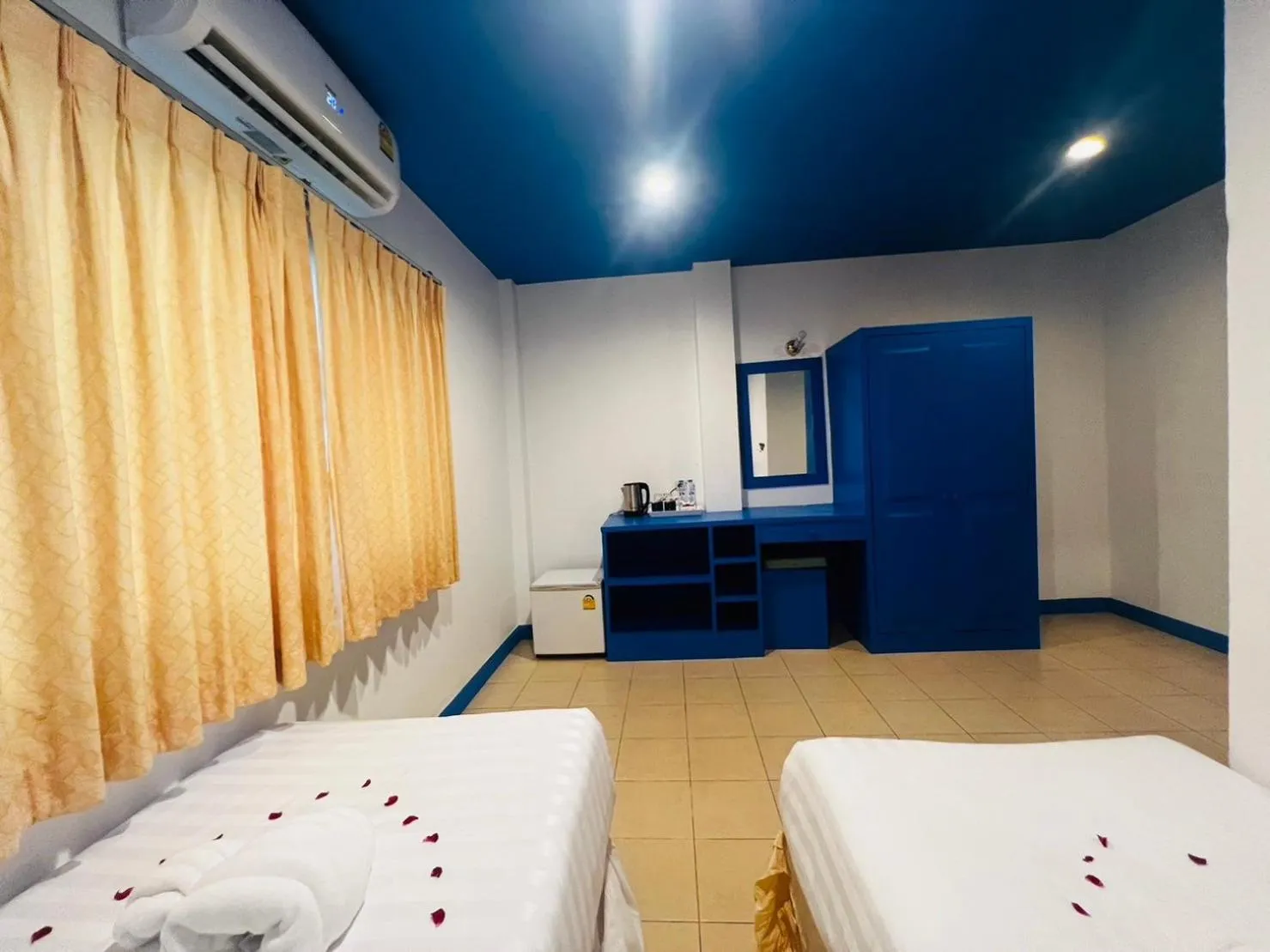 Bed in Blue Planet Hotel