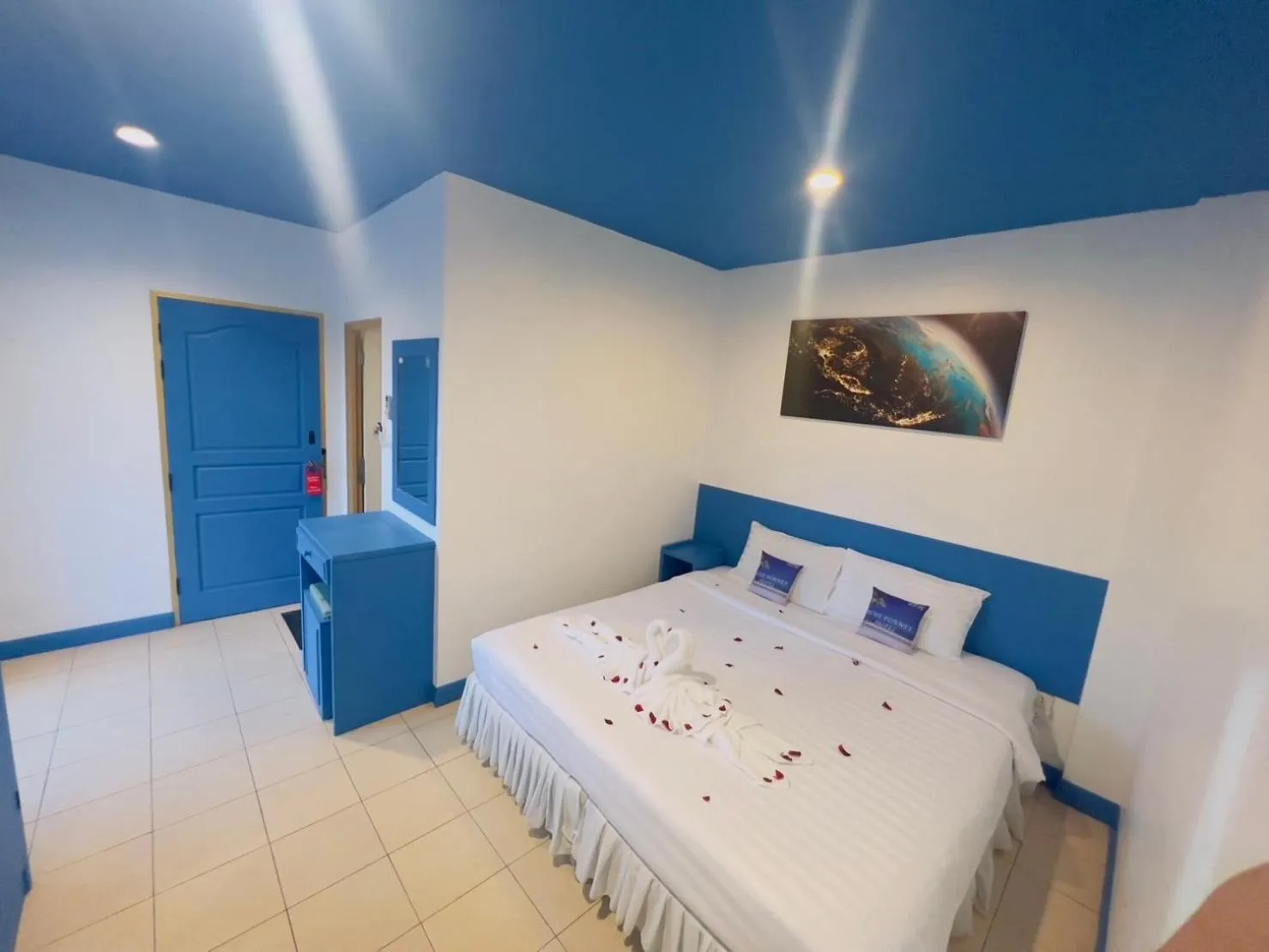 Bed in Blue Planet Hotel