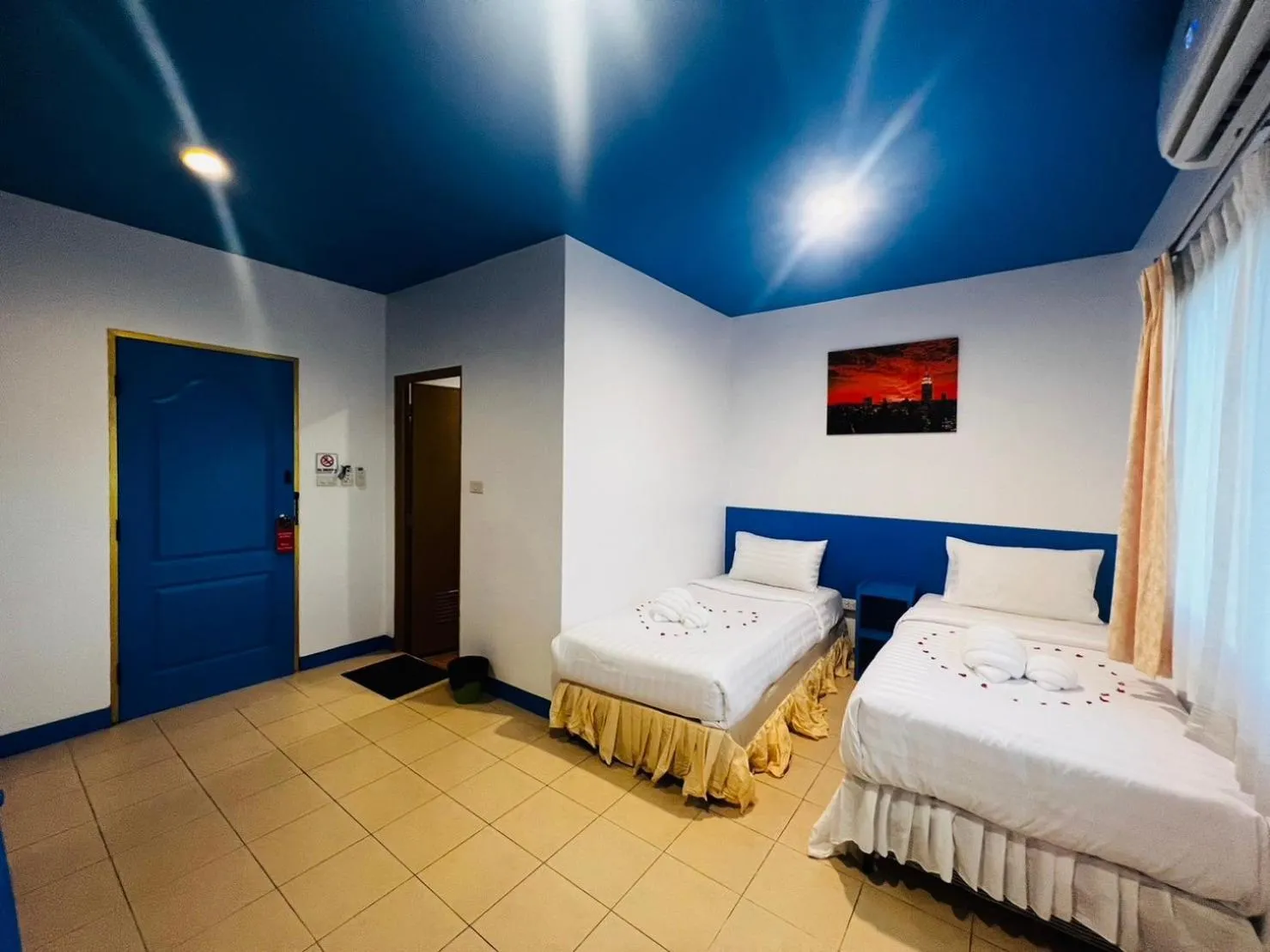 Bed in Blue Planet Hotel