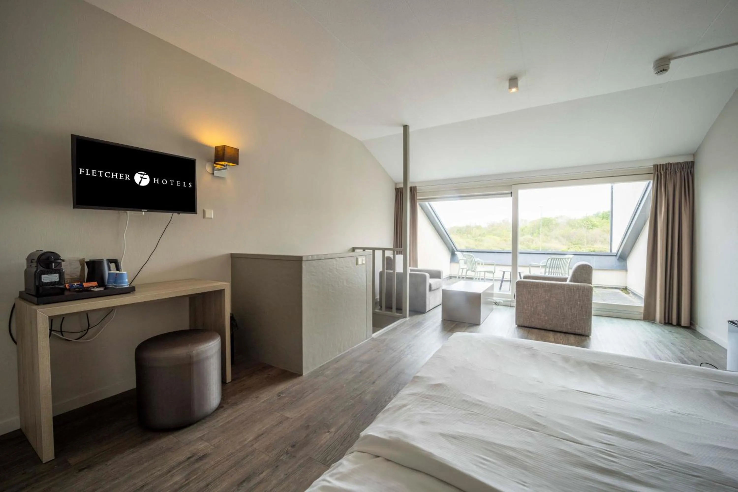 Photo of the whole room, Bed in Fletcher Zuiderduin Beachhotel