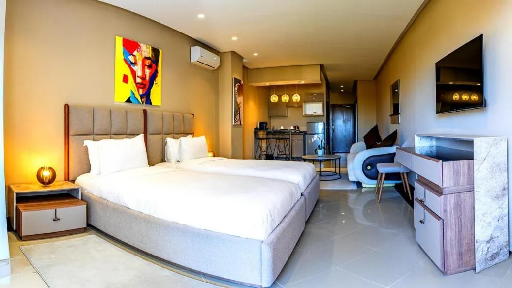 Bed in PLAYA DEL PACHA Suites Hotel