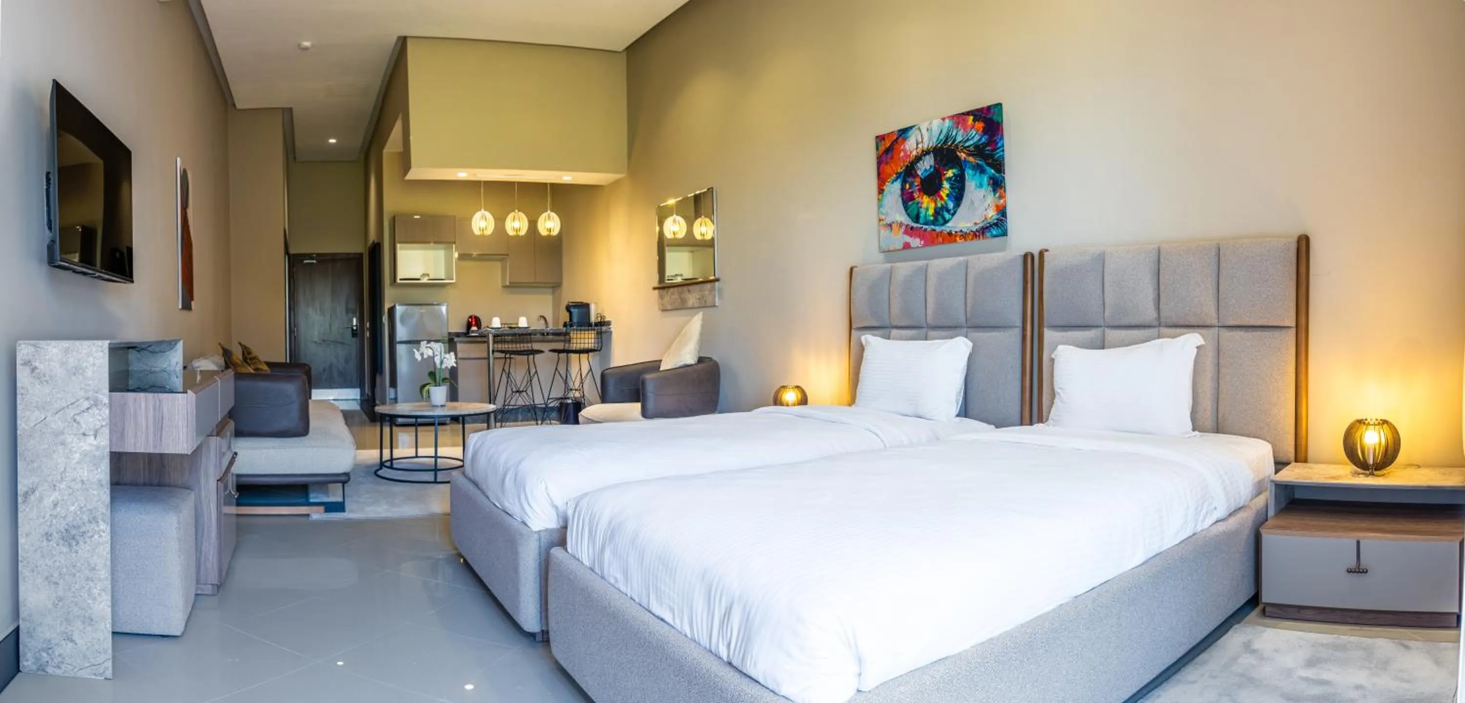 Bed in PLAYA DEL PACHA Suites Hotel