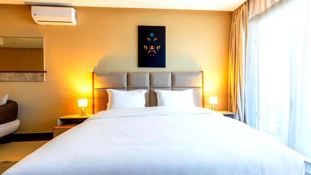 Bed in PLAYA DEL PACHA Suites Hotel