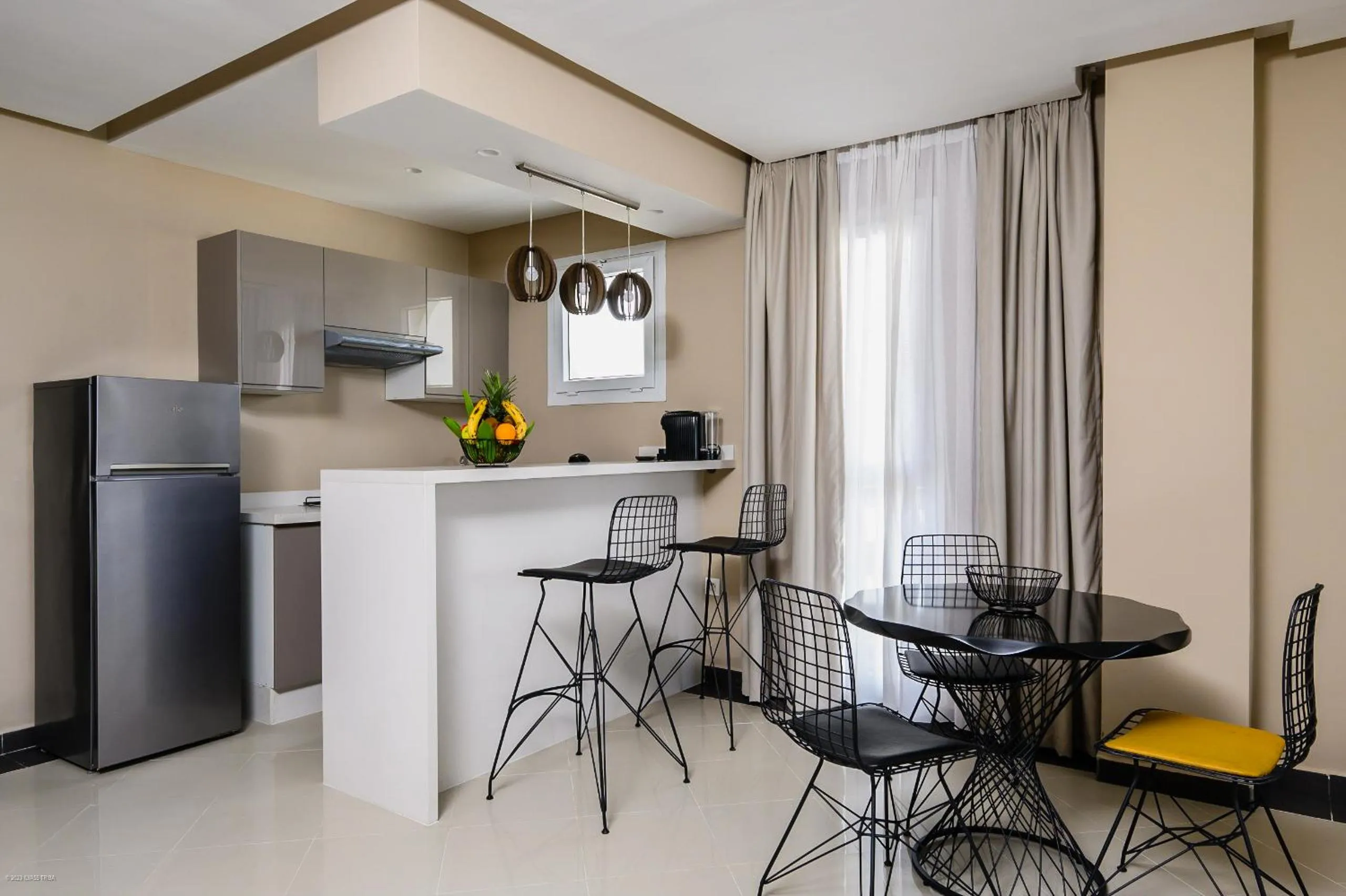 Kitchen or kitchenette in PLAYA DEL PACHA Suites Hotel
