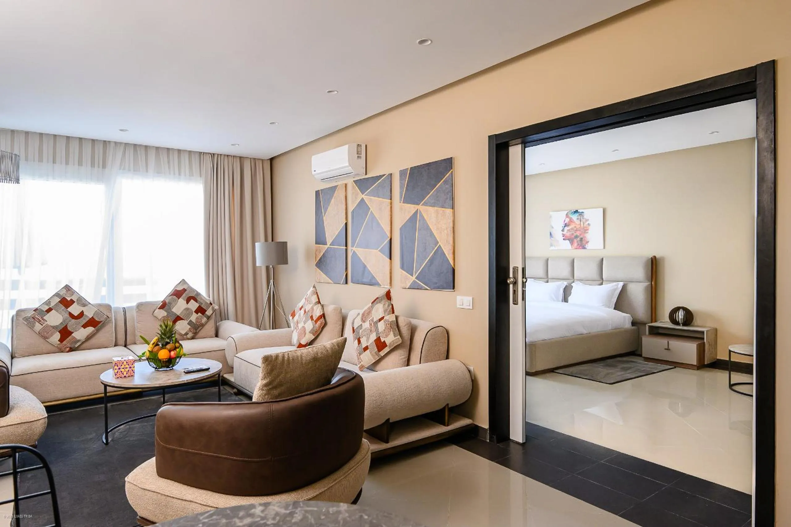 Living room, Bed in PLAYA DEL PACHA Suites Hotel