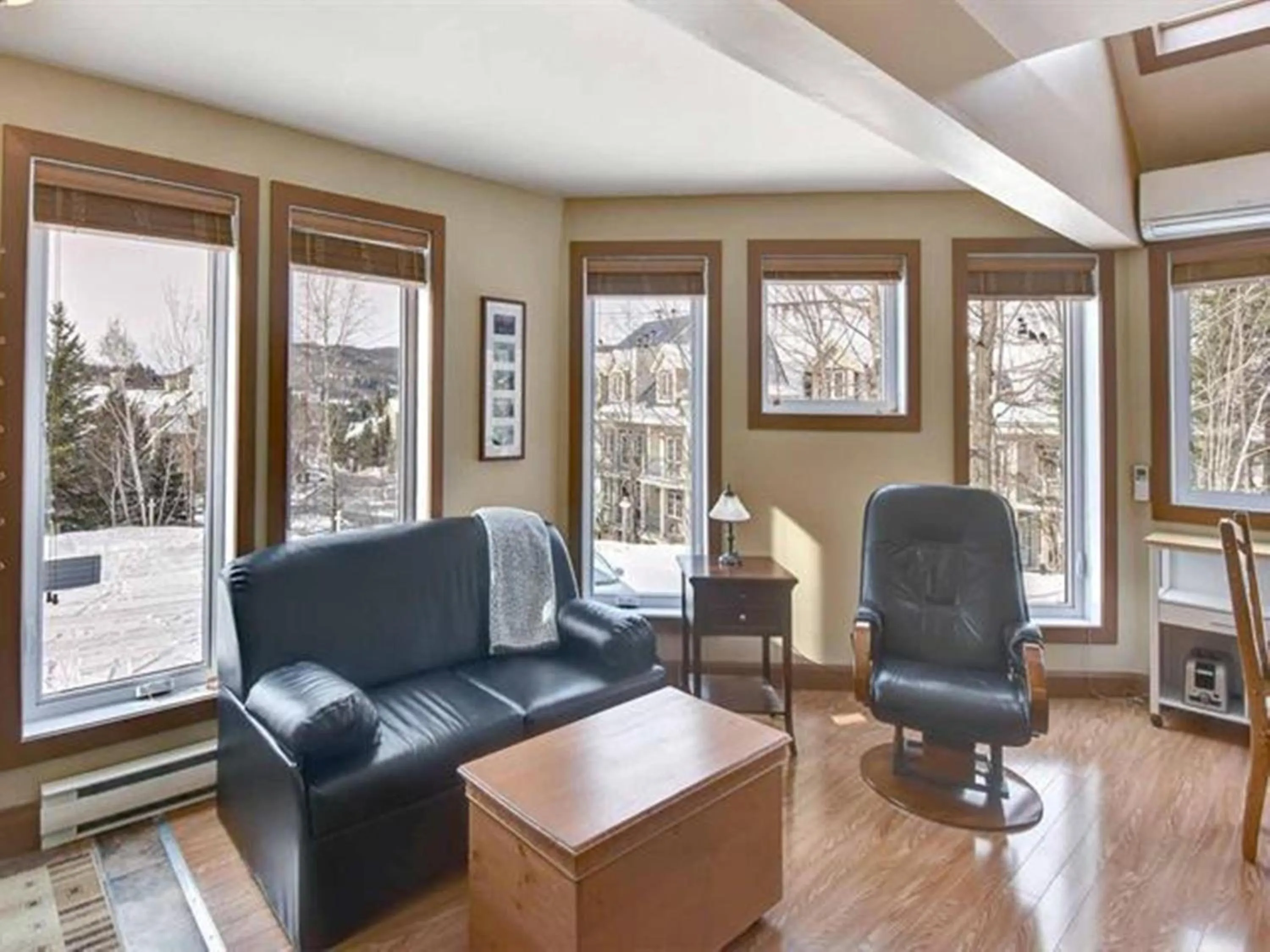 Living room in Bright Condo near the Lake by GLOBALSTAY