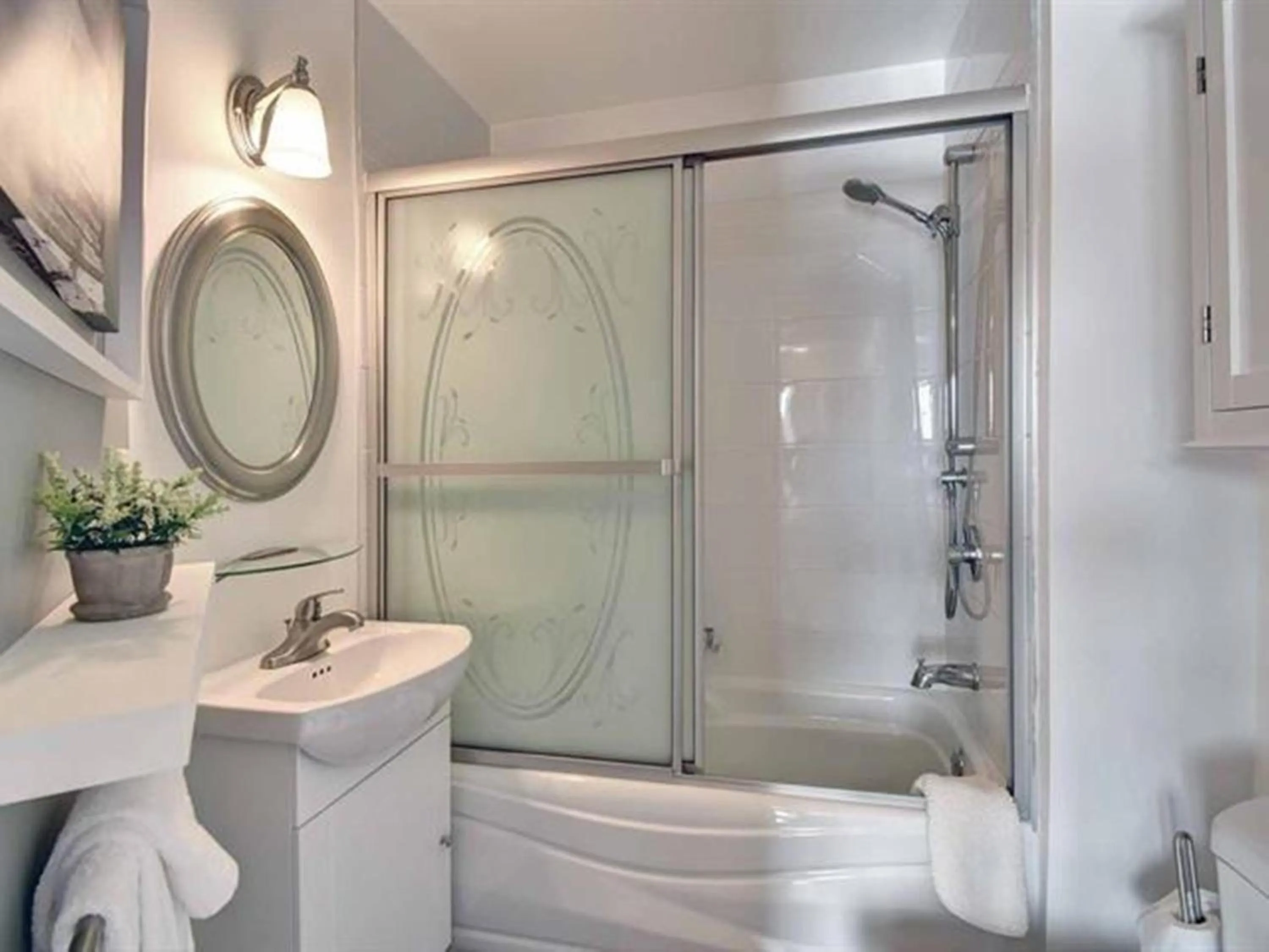 Bathroom in Bright Condo near the Lake by GLOBALSTAY