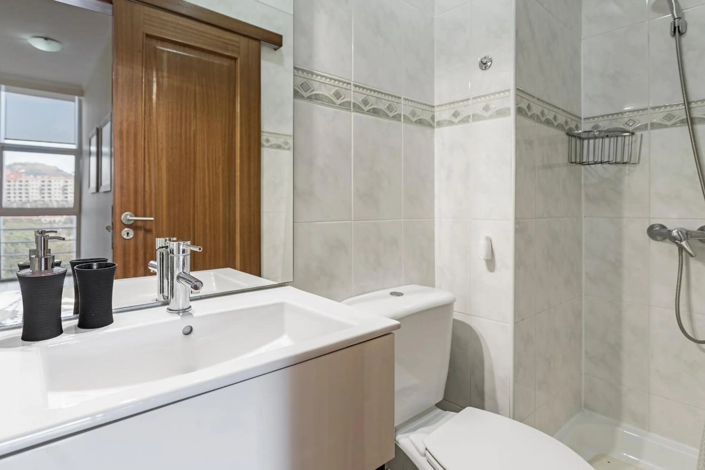 Shower in Achada I by An Island Apart