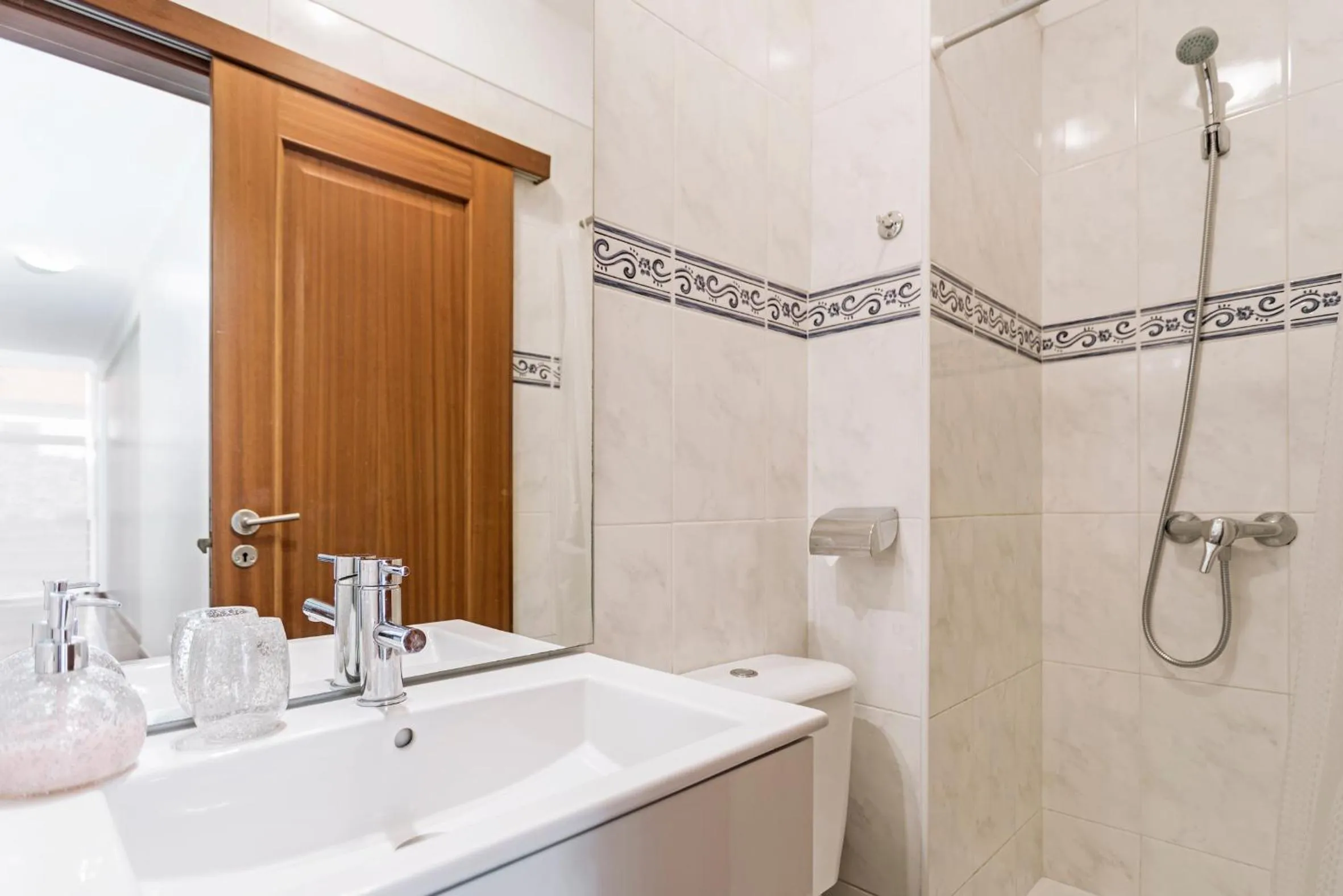 Shower in Achada I by An Island Apart