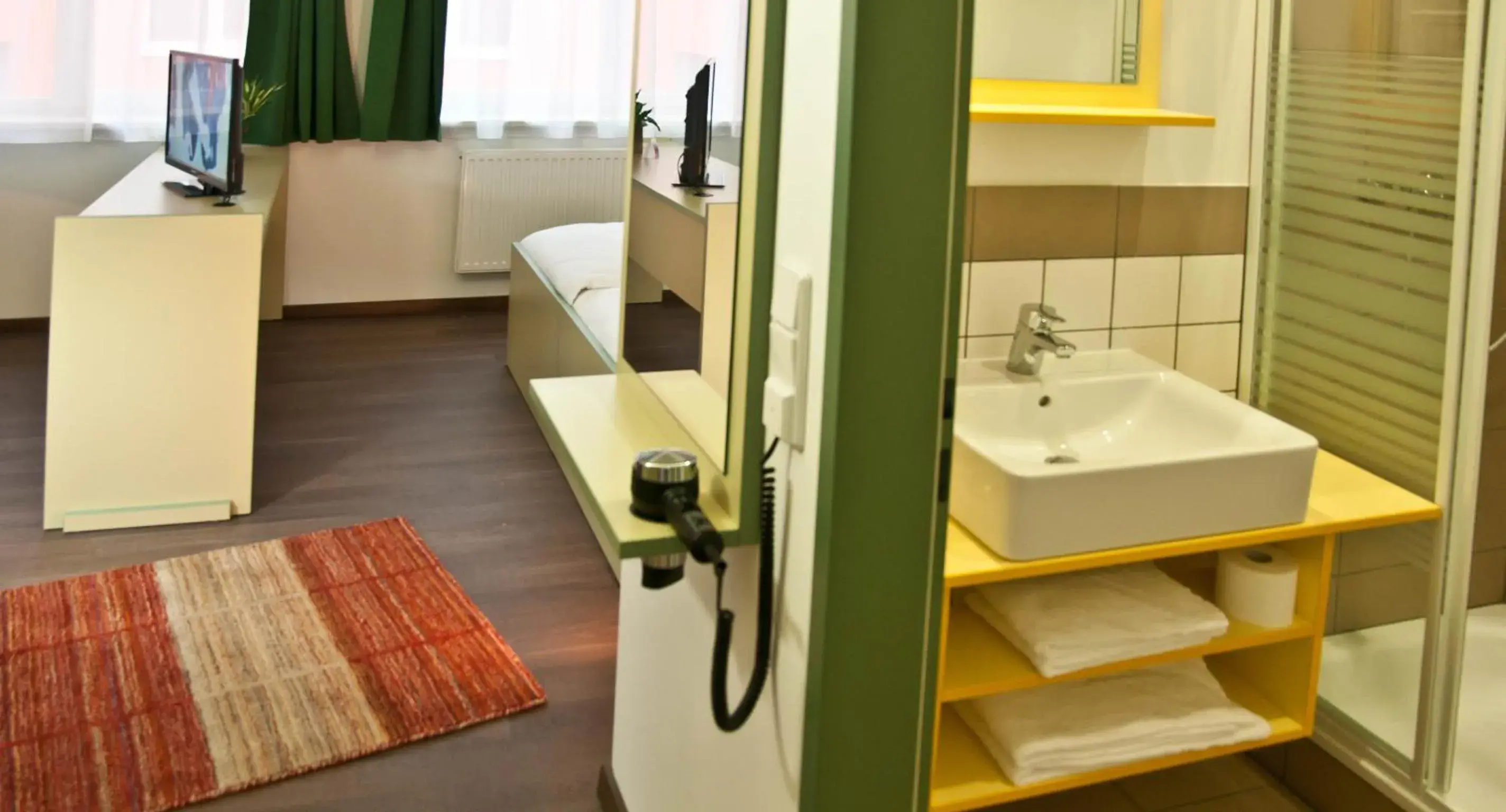 Deluxe Single Room in WinRooms "hotel&apartments" Deluxe Single Room in WinRooms "hotel&apartments"