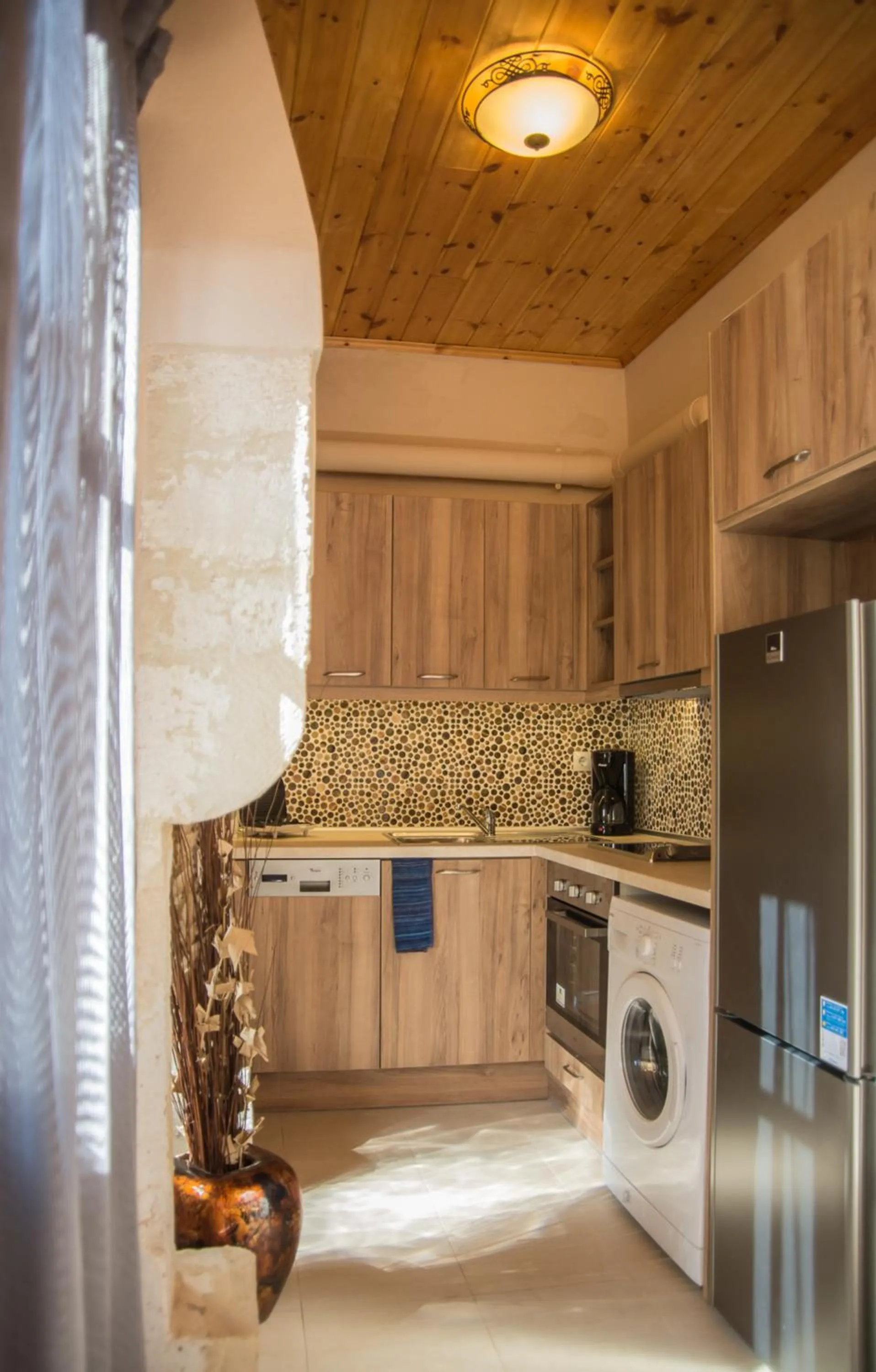 Kitchen or kitchenette in Porto Enetiko Suites