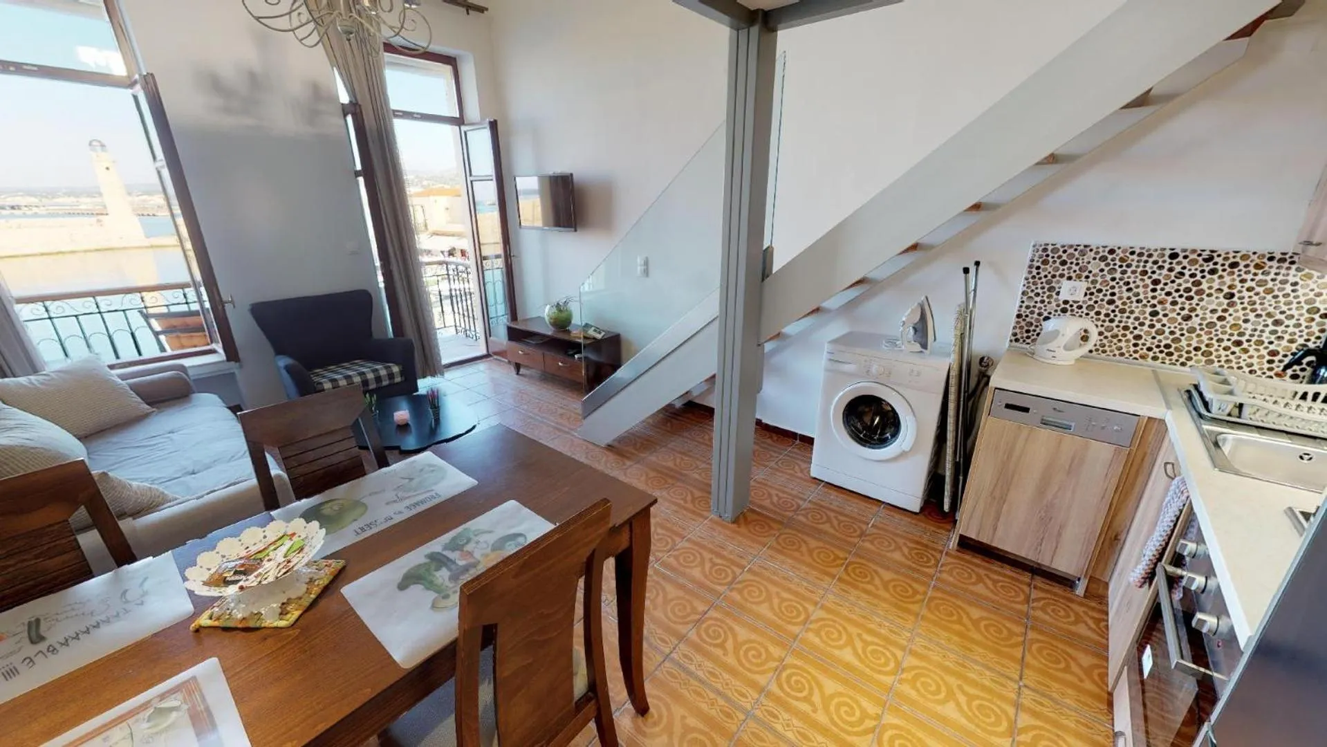 Kitchen or kitchenette in Porto Enetiko Suites