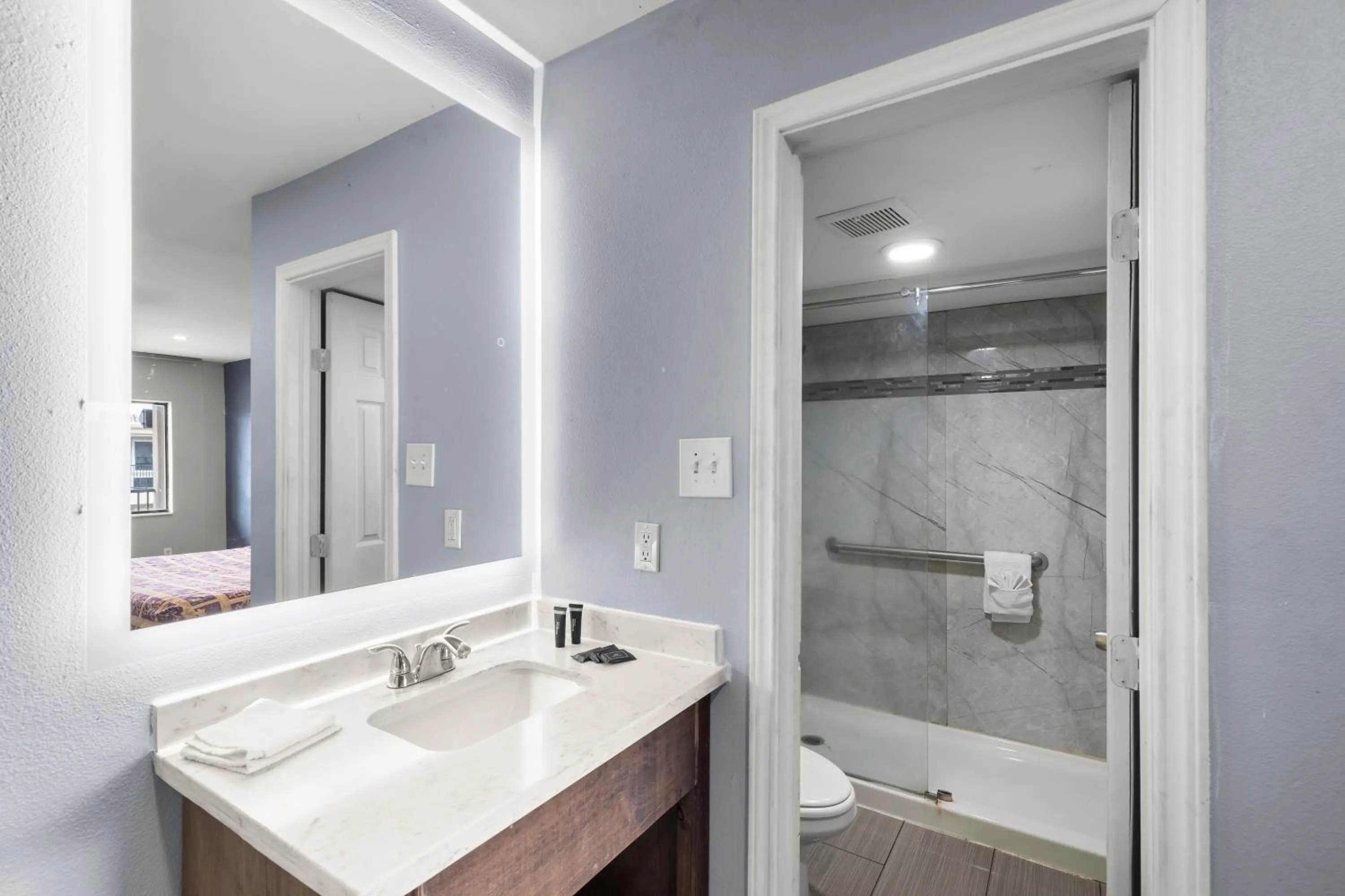 Bathroom in Travel Inn & Suites