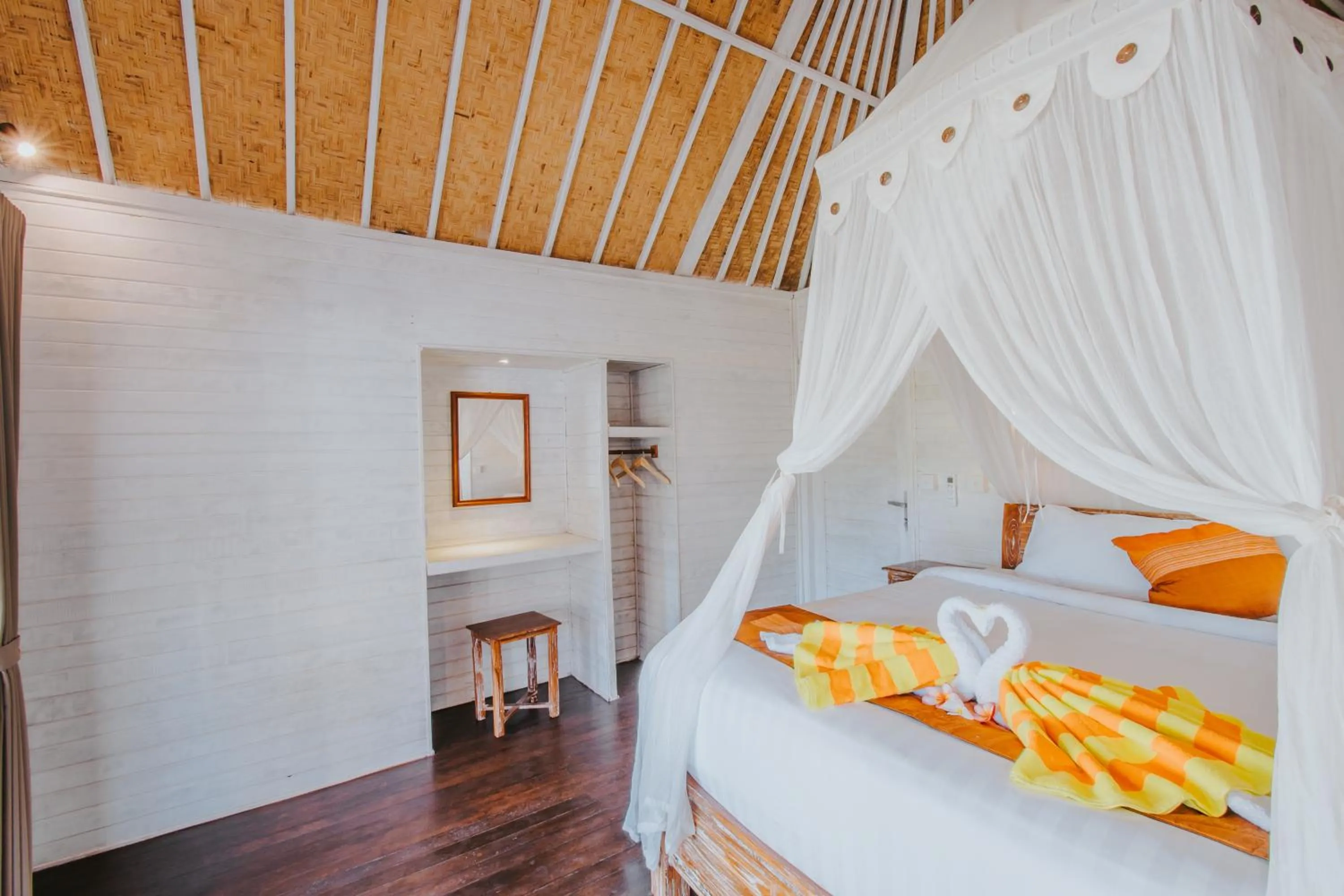 Bed in Paluh Beach Huts