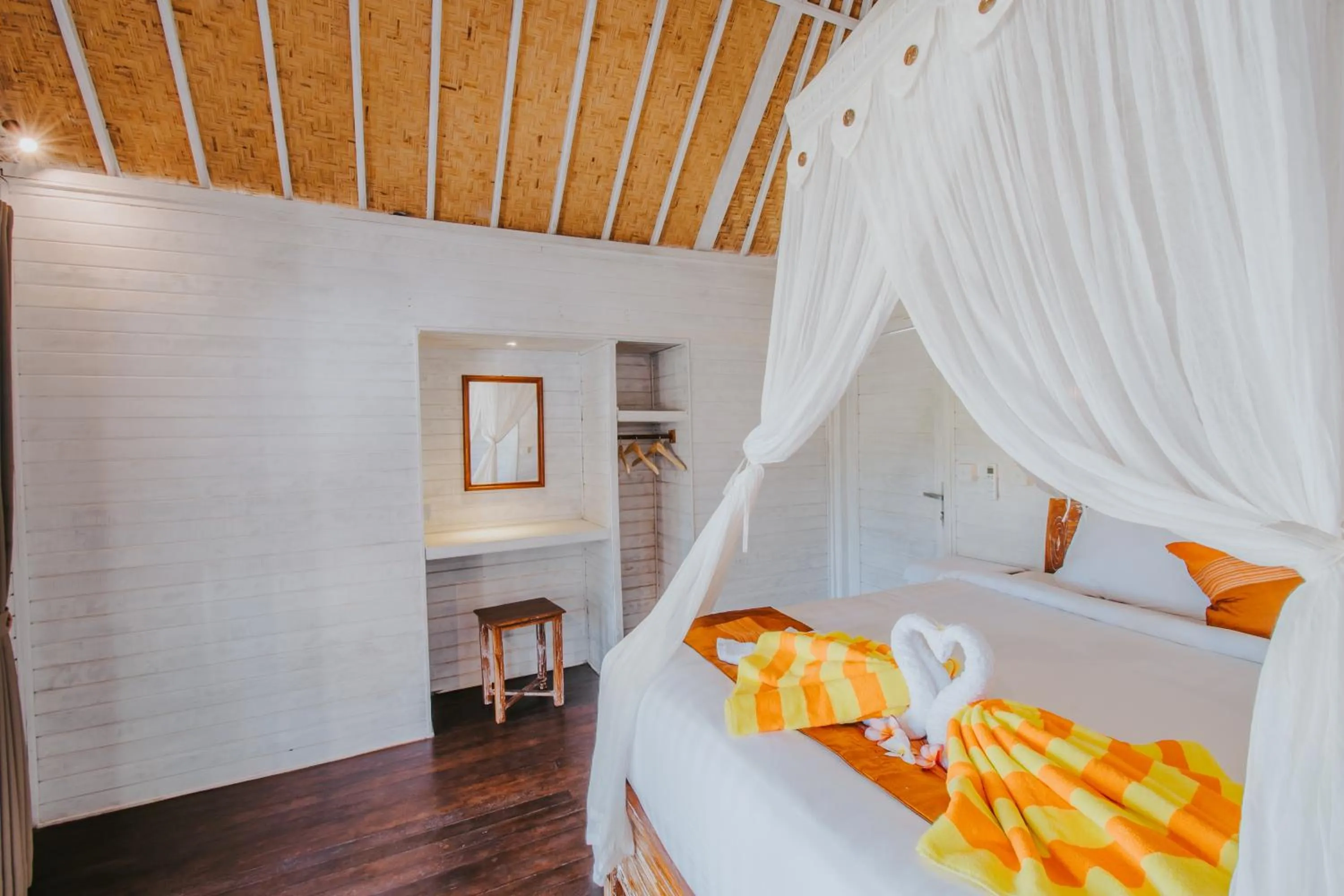 Bed in Paluh Beach Huts