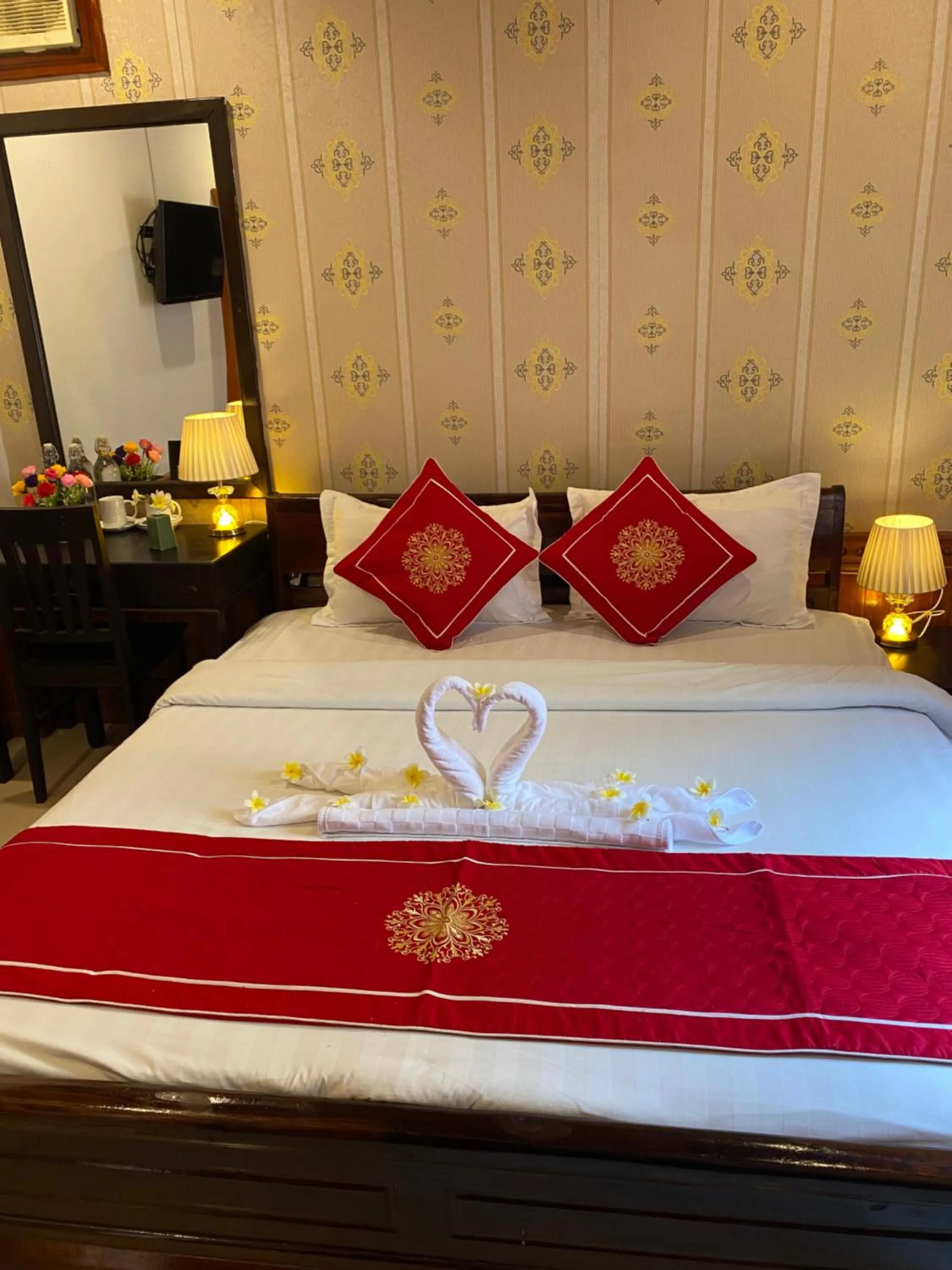 Bed in Golden Lotus Boutique Hotel
