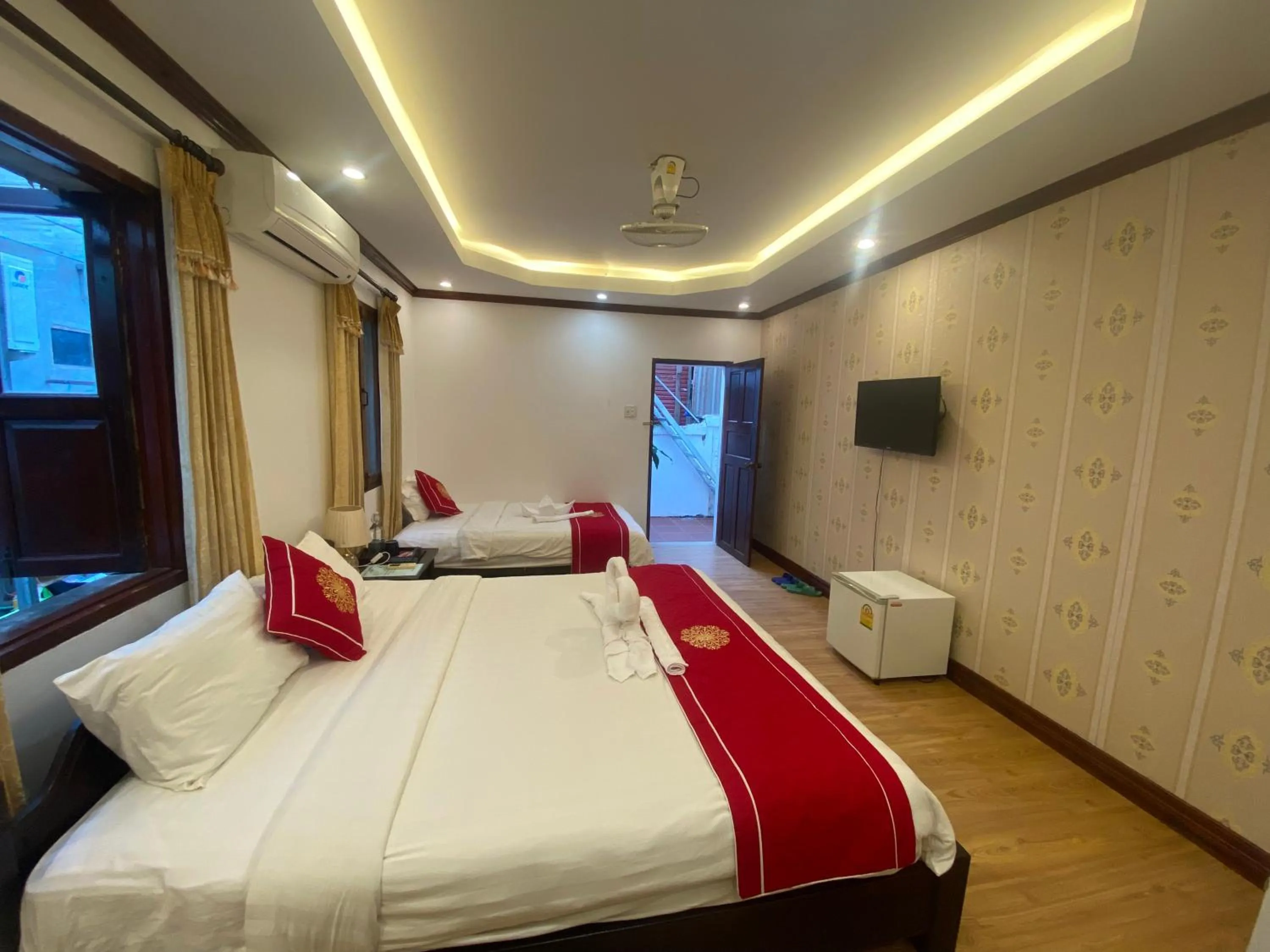 Photo of the whole room, Bed in Golden Lotus Boutique Hotel