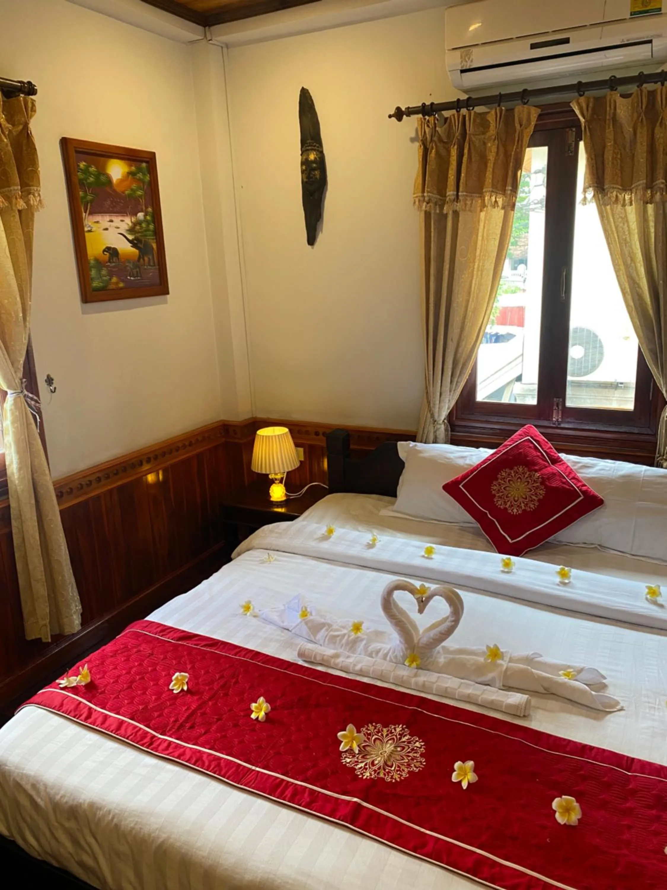 Bed in Golden Lotus Boutique Hotel