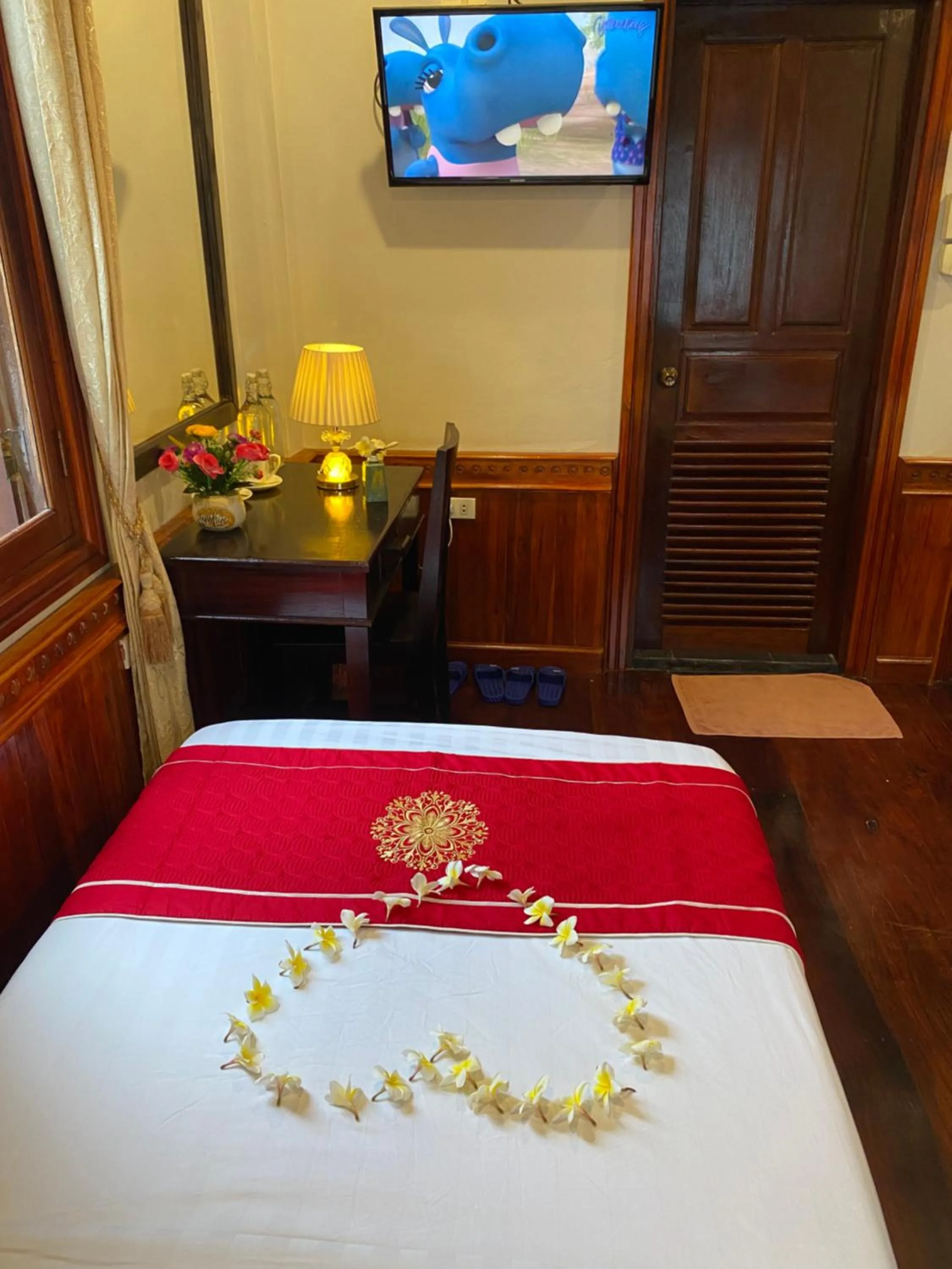 Bed in Golden Lotus Boutique Hotel