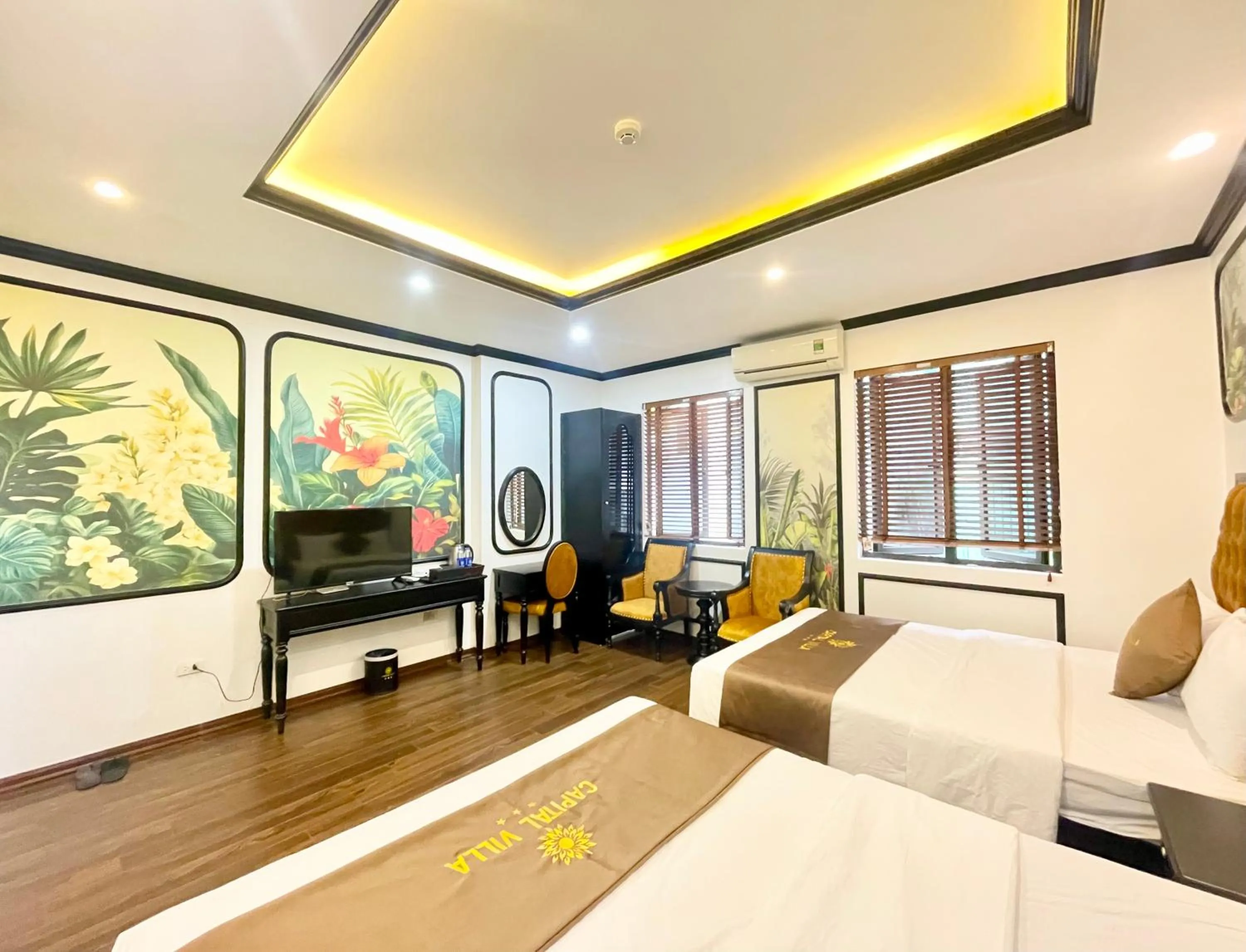 TV and multimedia, Bed in Capital CauGiay Hotel