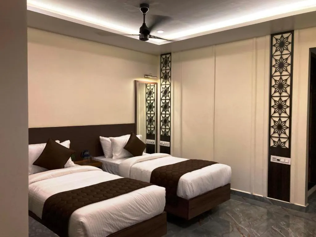 Bed in MURALI KRISHNA APART HOTEL
