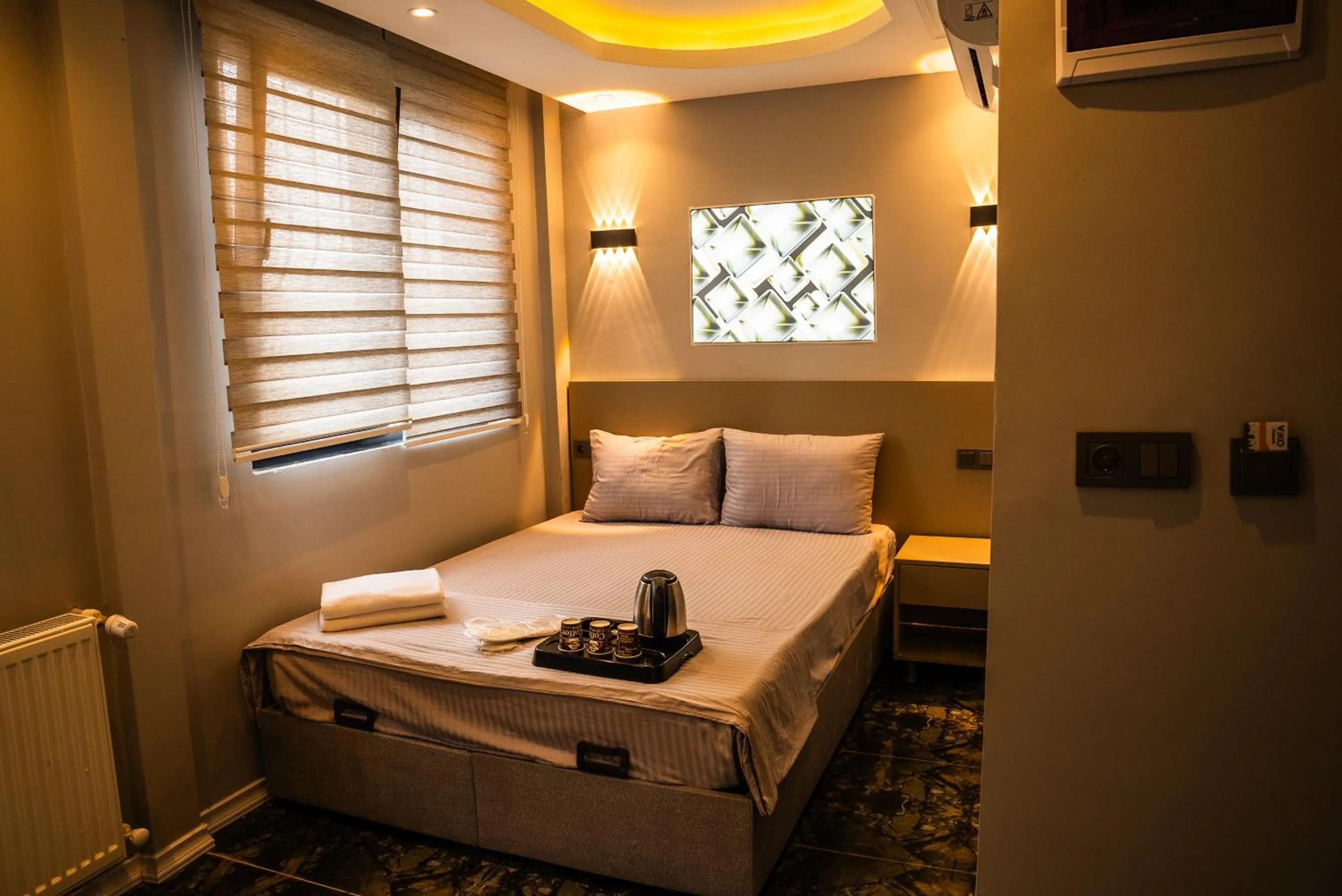 Bed in CK PALACE Hotel