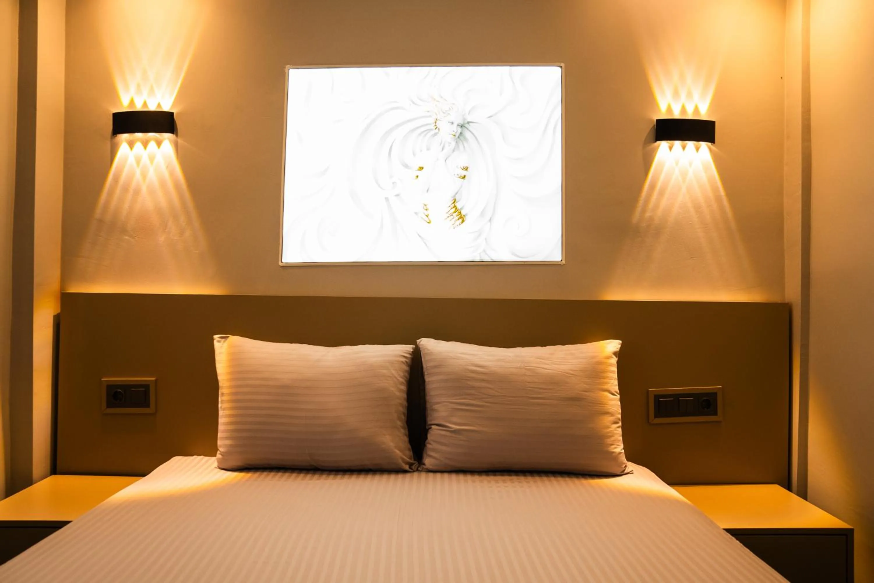 Bed in CK PALACE Hotel