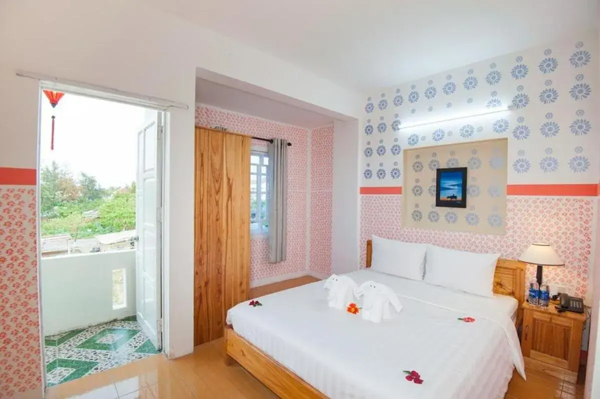 Quadruple Room with Balcony - single occupancy in Cua Dai Beach Homestay Quadruple Room with Balcony - single occupancy in Cua Dai Beach Homestay