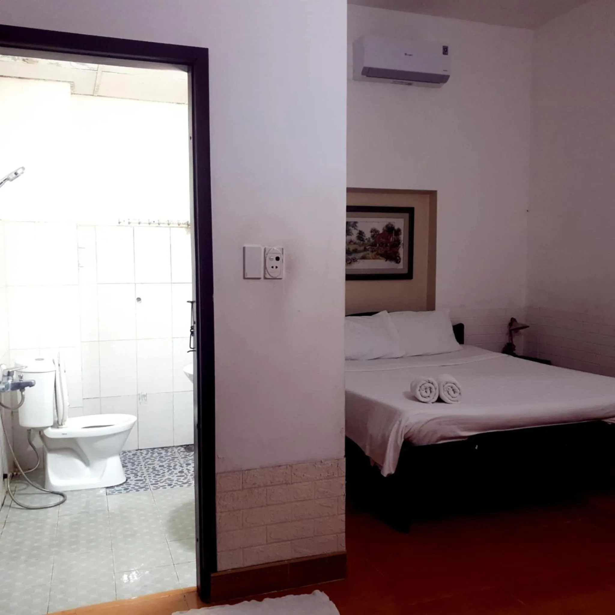 Shower, Bed in Cua Dai Beach Homestay