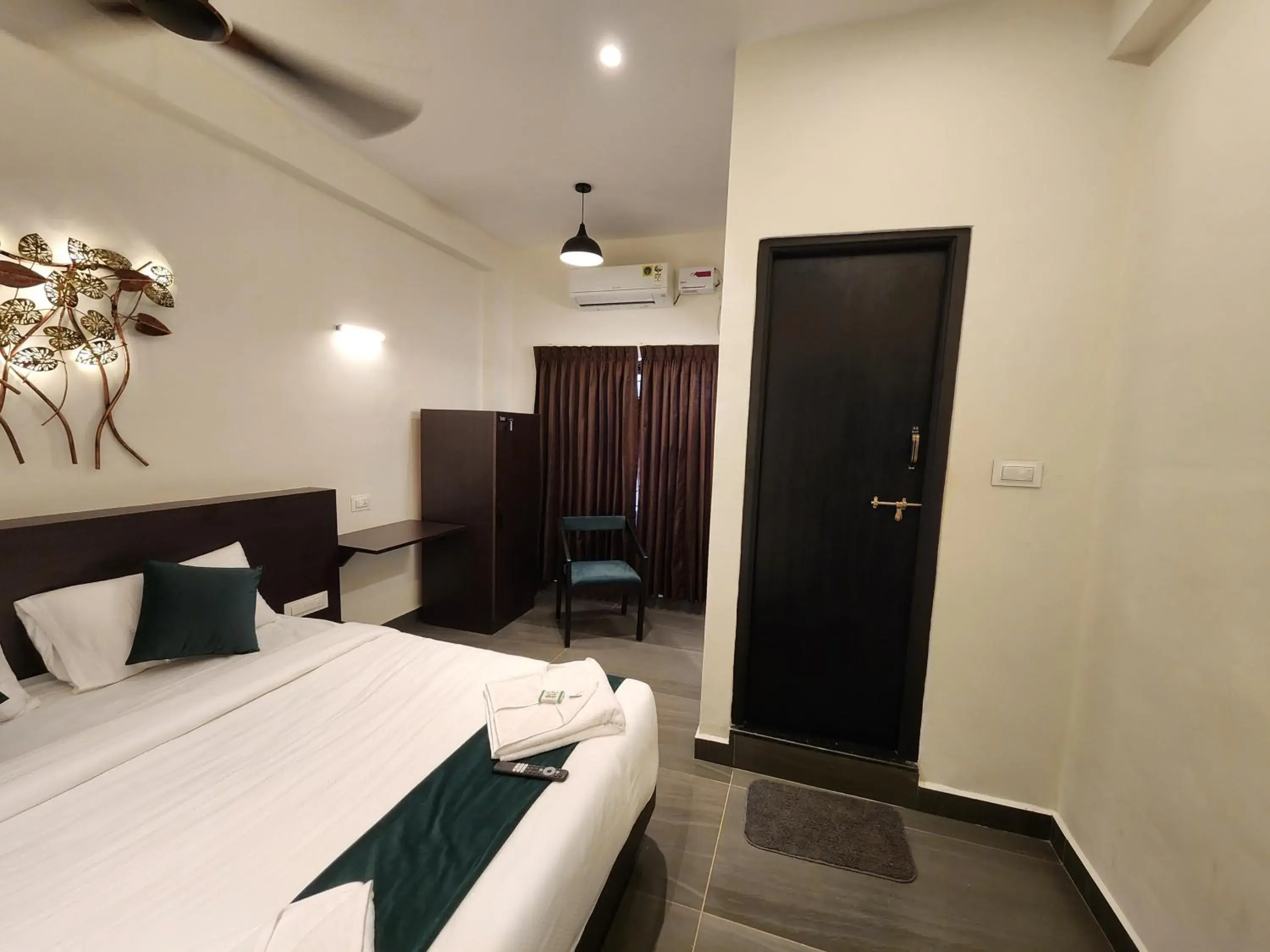 Deluxe King Room in Udupi Comforts Deluxe King Room in Udupi Comforts
