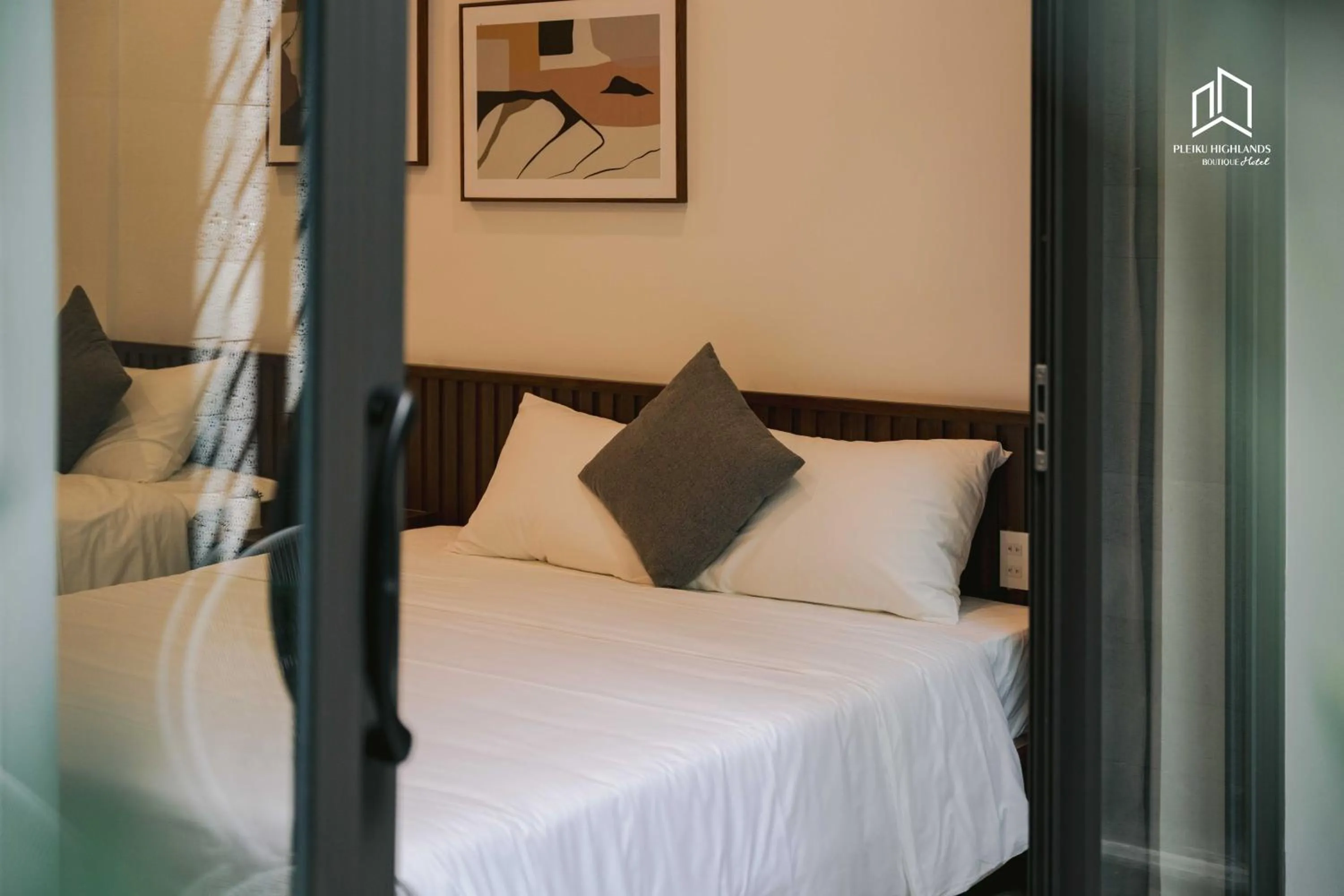 Photo of the whole room, Bed in PLEIKU HIGHLANDS BOUTIQUE HOTEL