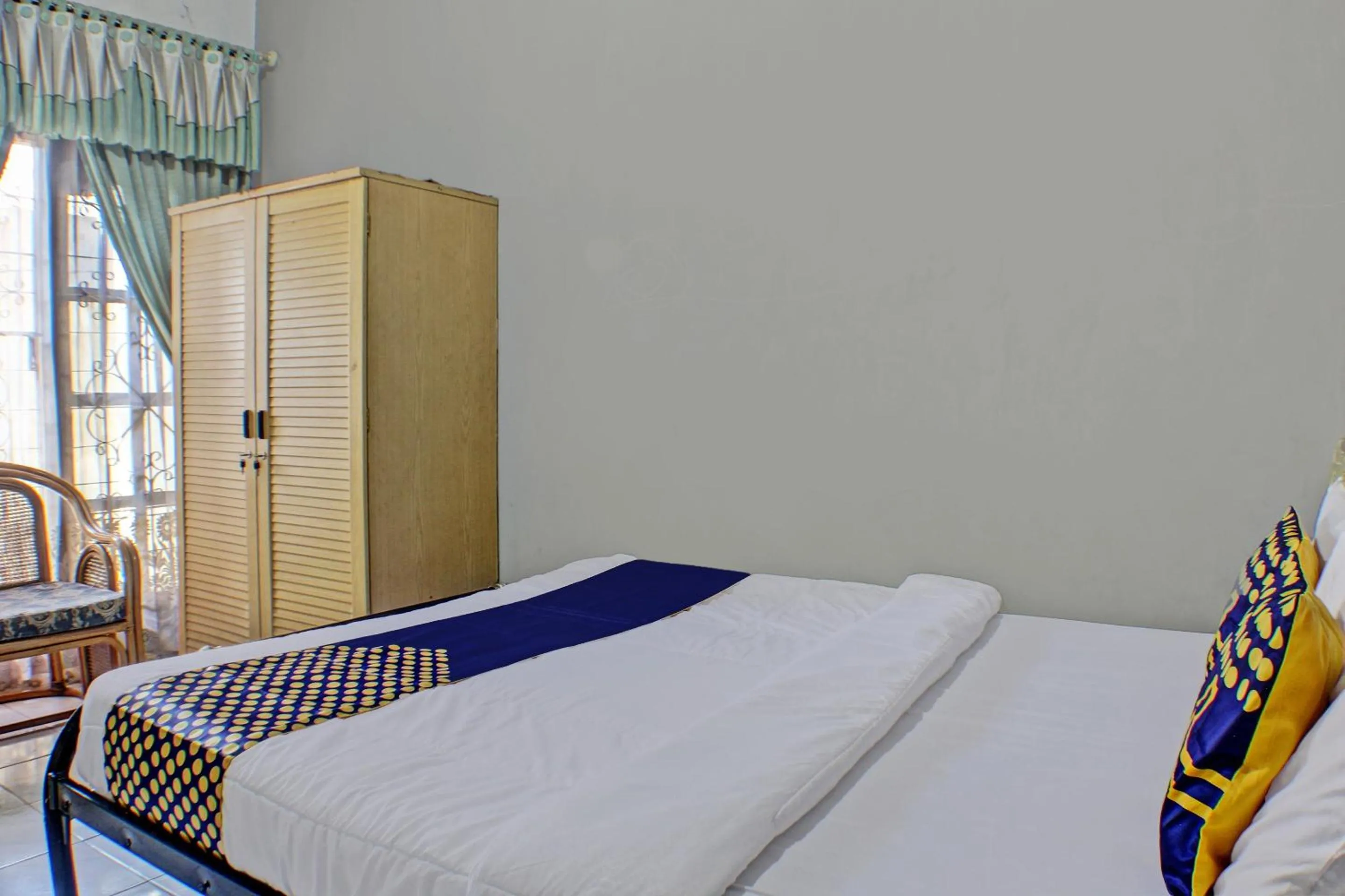 Bedroom in Hotel O Badar Guest House Syariah