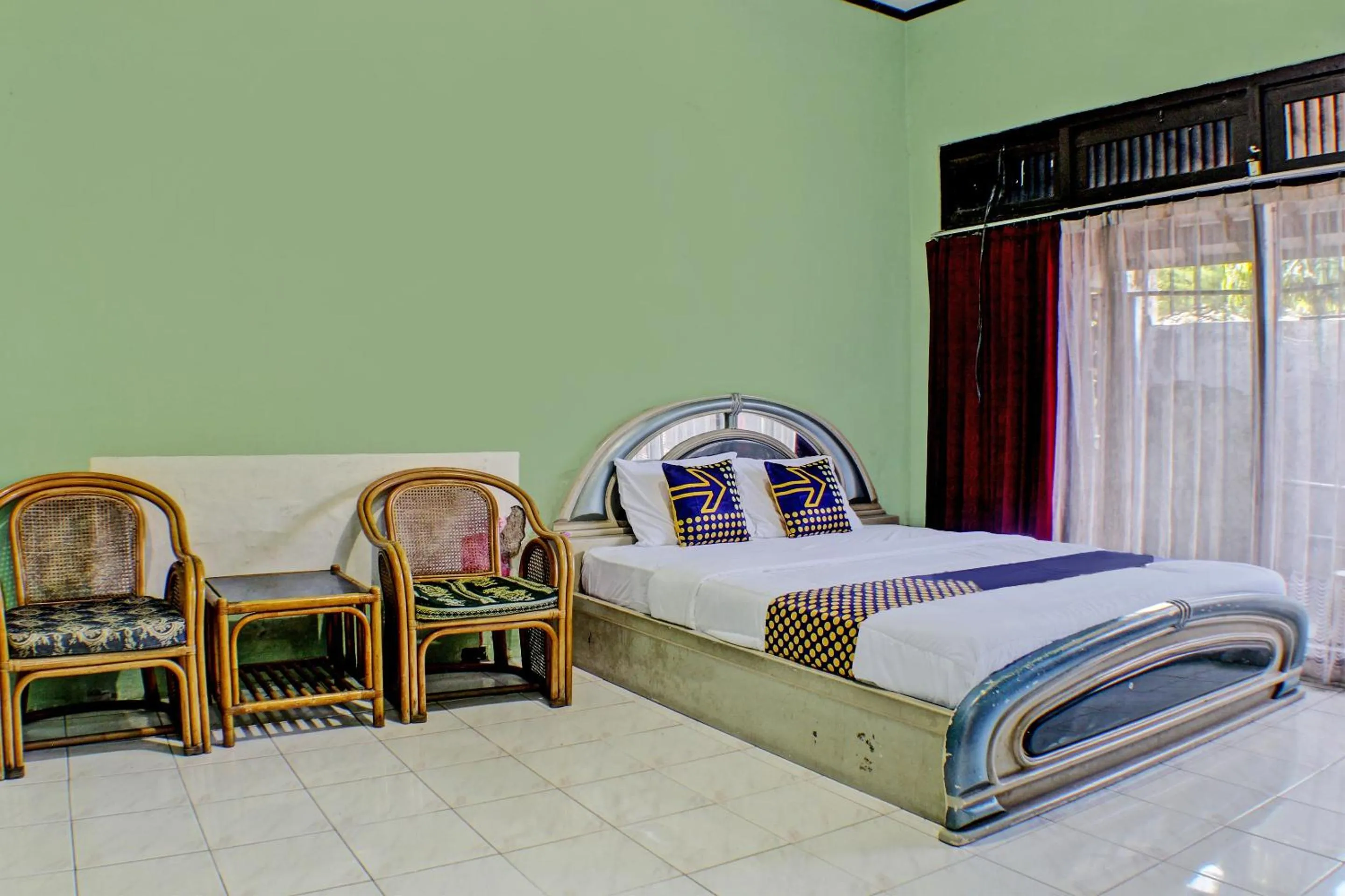 Bedroom in Hotel O Badar Guest House Syariah