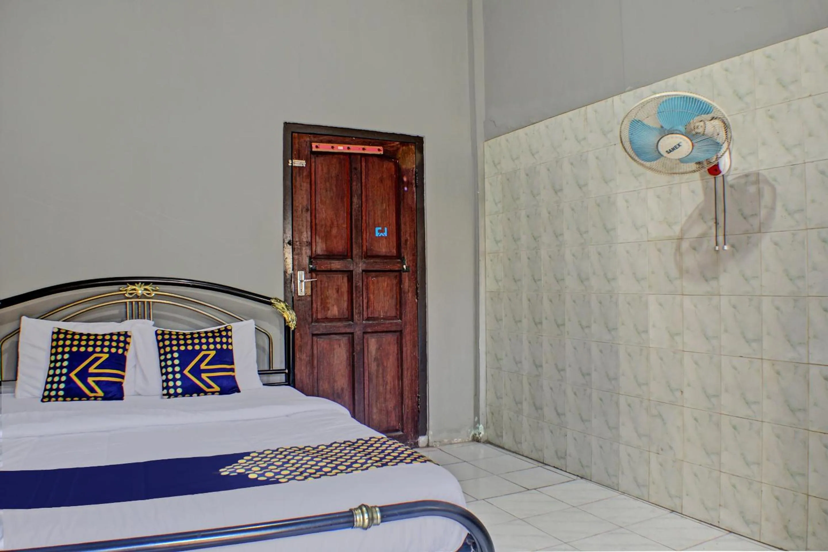 Bedroom in Hotel O Badar Guest House Syariah