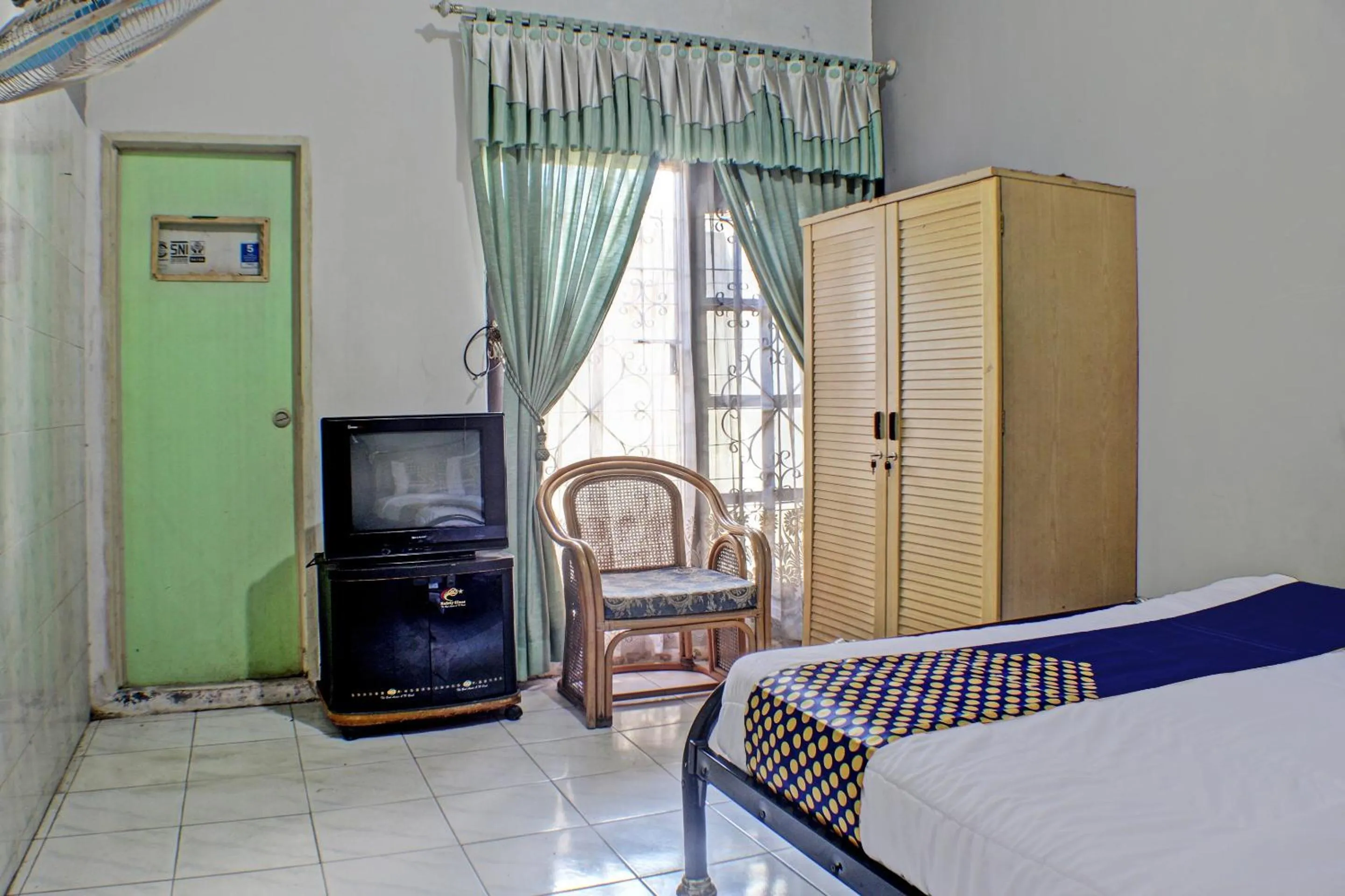 Bedroom in Hotel O Badar Guest House Syariah
