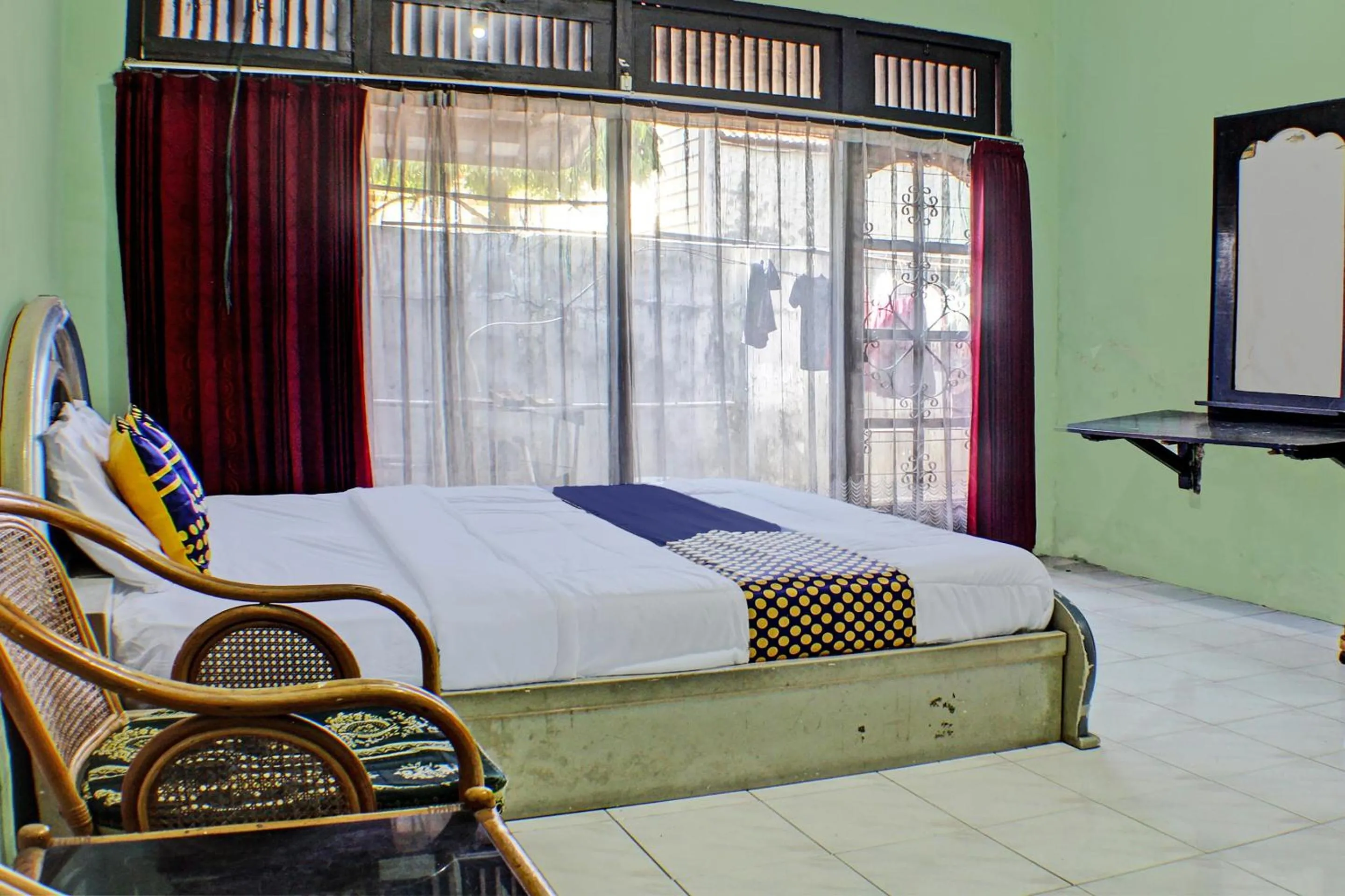 Bedroom in Hotel O Badar Guest House Syariah