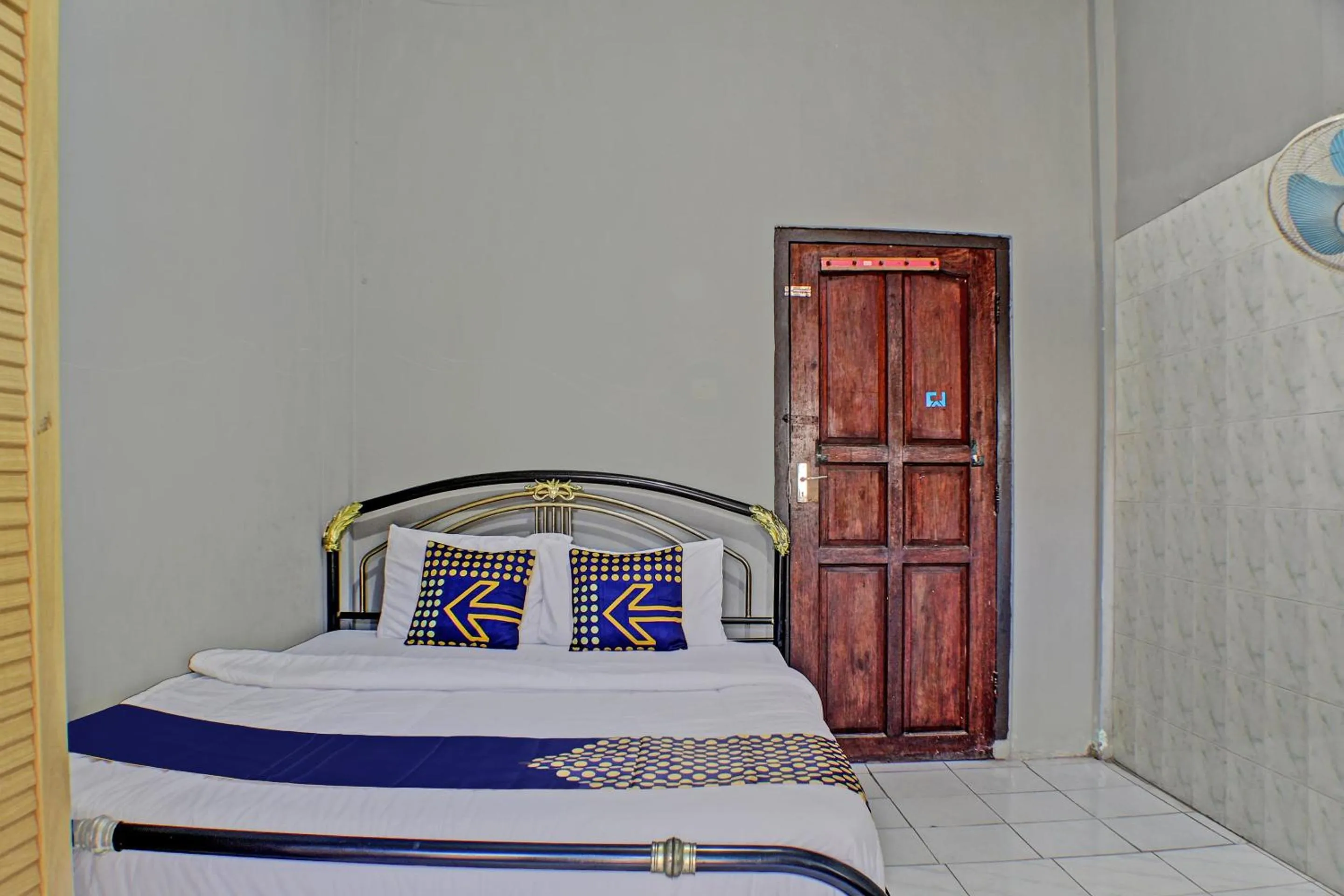 Bedroom in Hotel O Badar Guest House Syariah