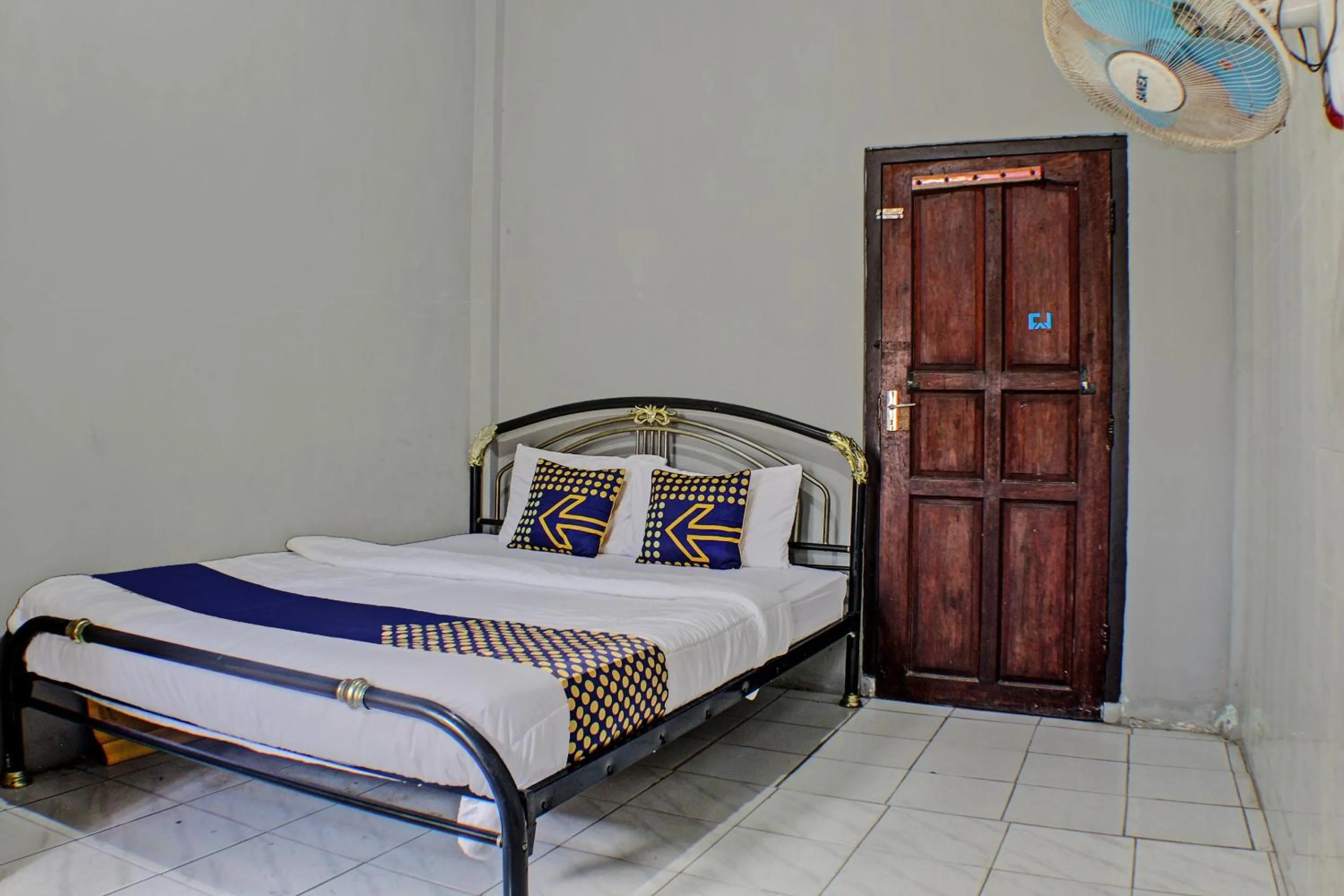 Bedroom in Hotel O Badar Guest House Syariah