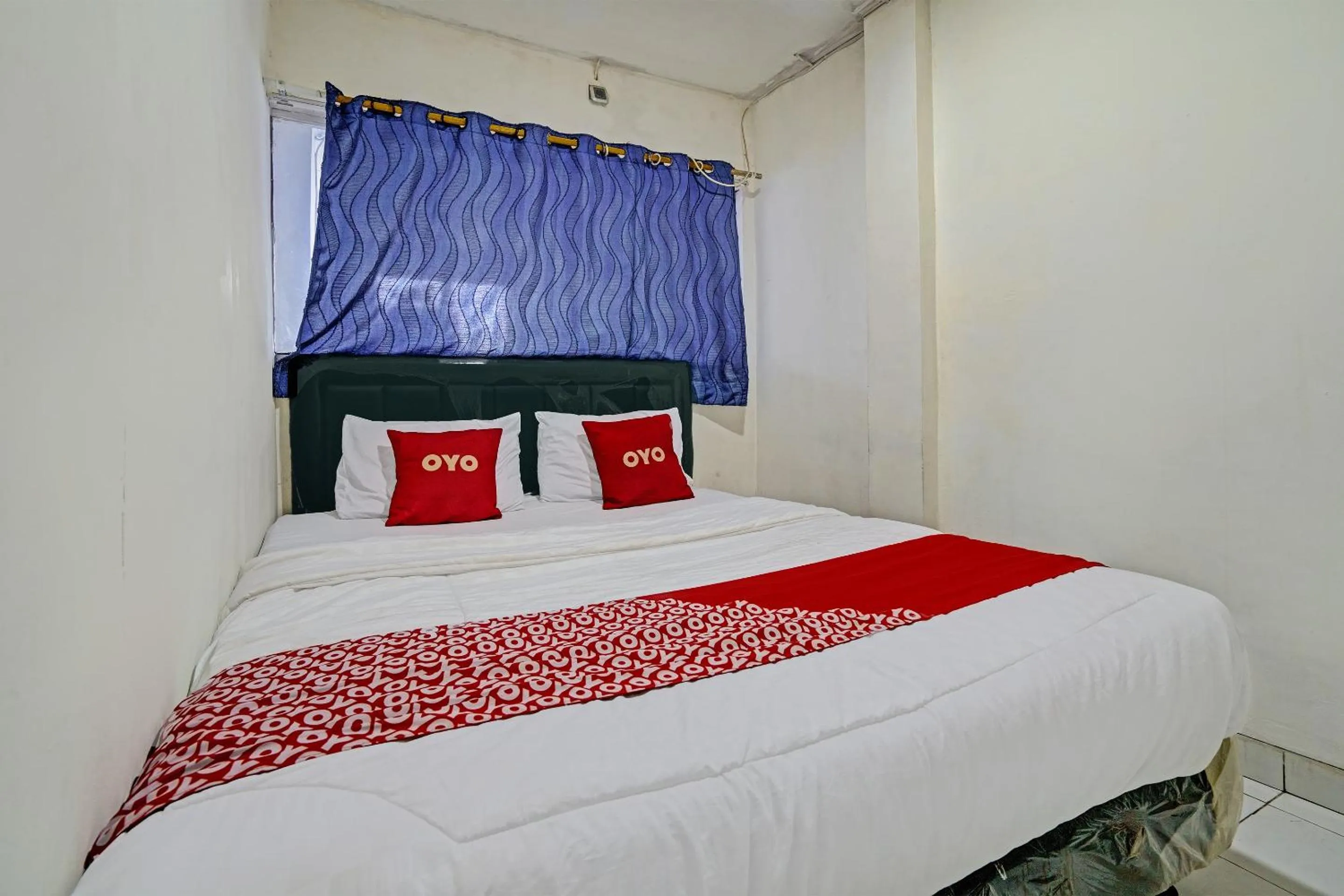 Bedroom in Hotel O Geulis Guest House Syariah