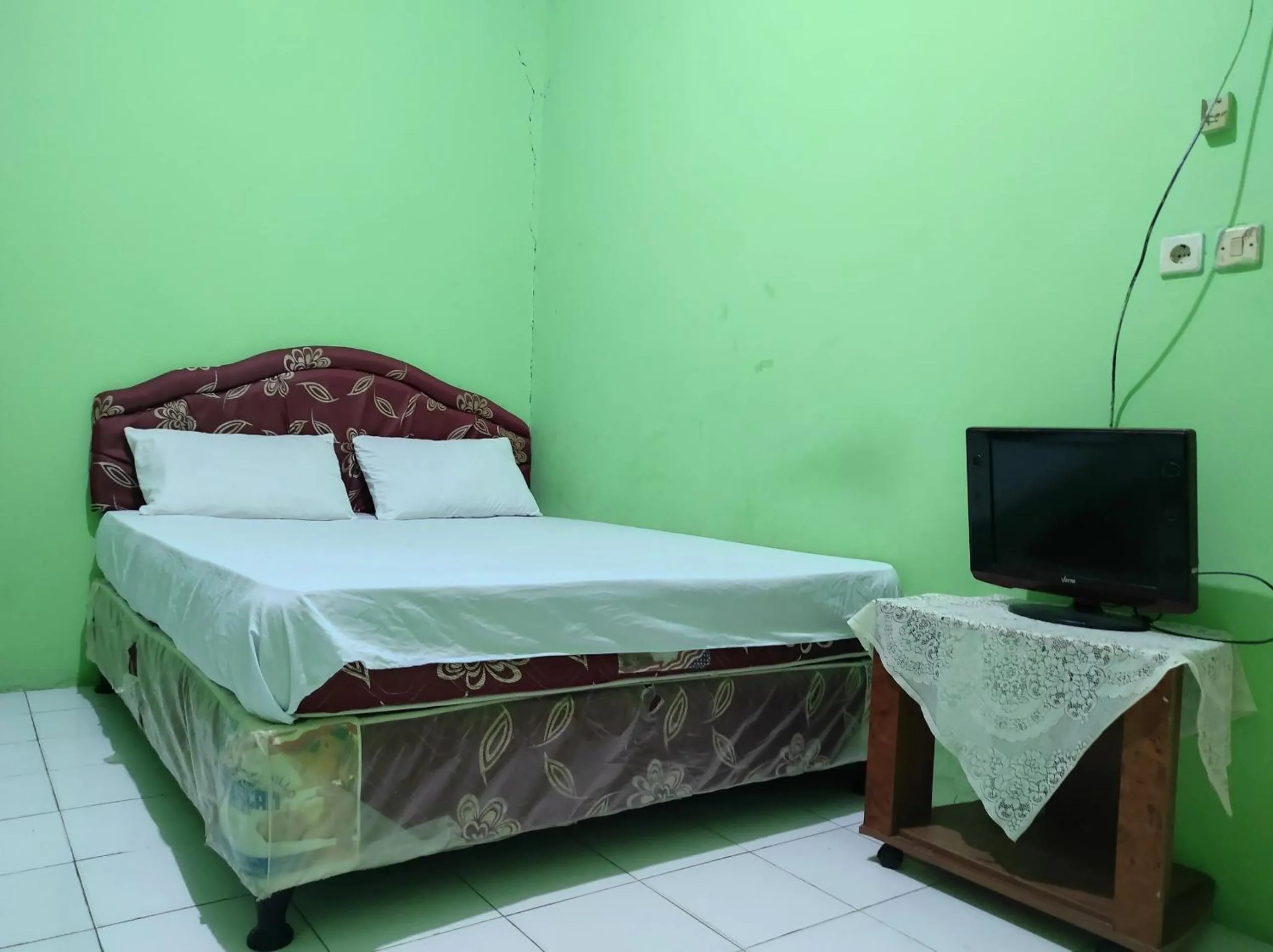 Bedroom, Bed in Hotel O Penginapan Syariah Al Syifa
