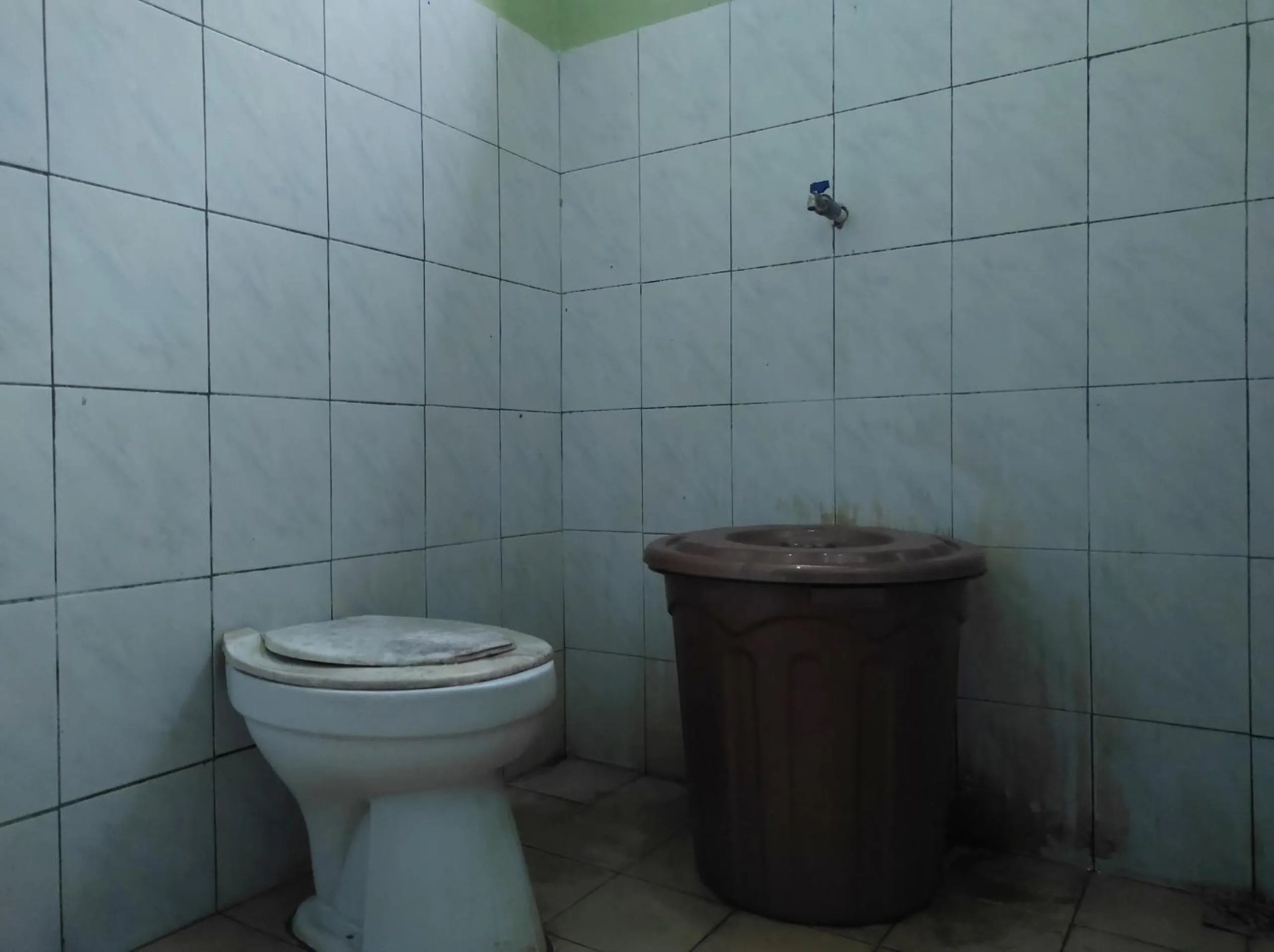 Bathroom in Hotel O Penginapan Syariah Al Syifa