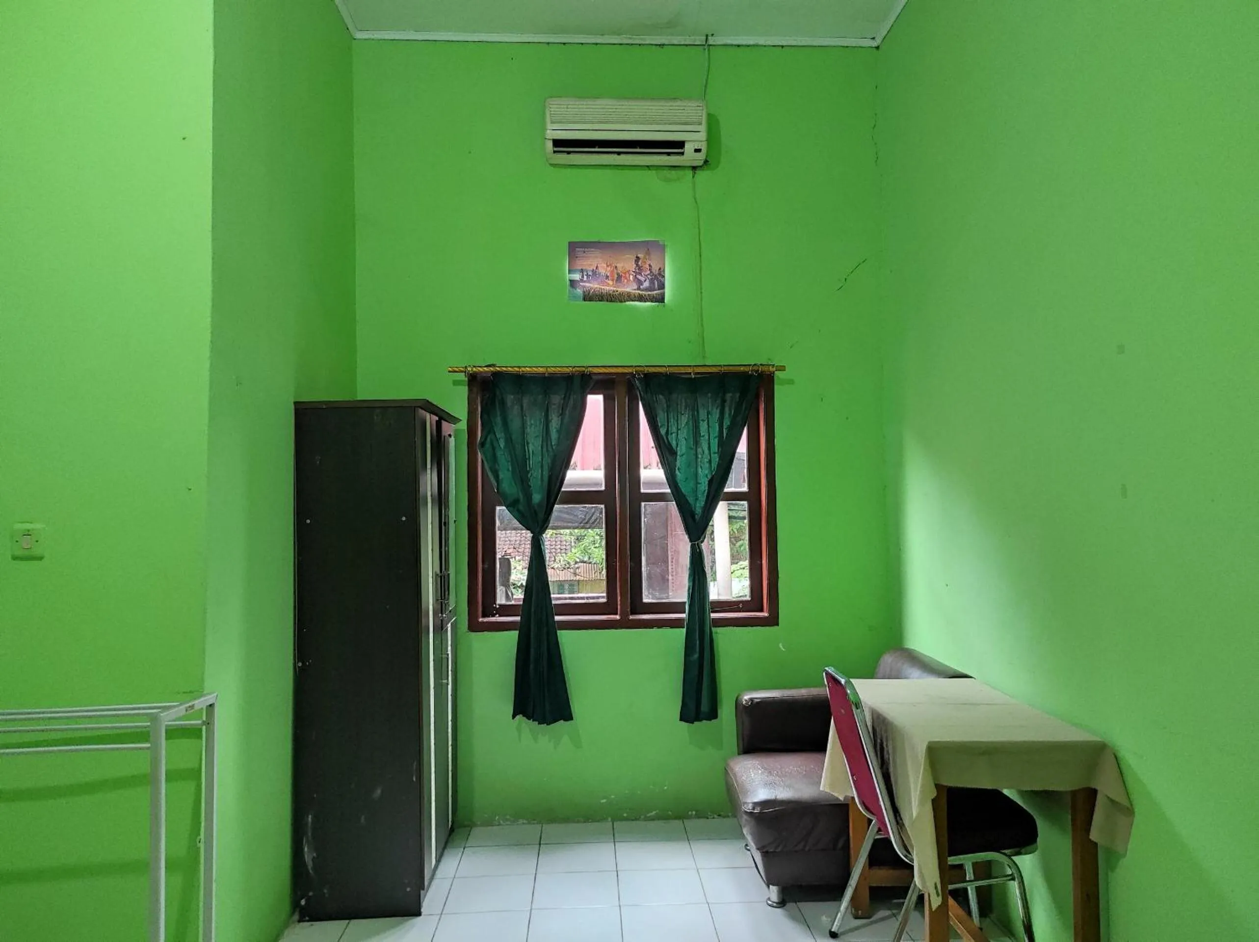 Bedroom in Hotel O Penginapan Syariah Al Syifa