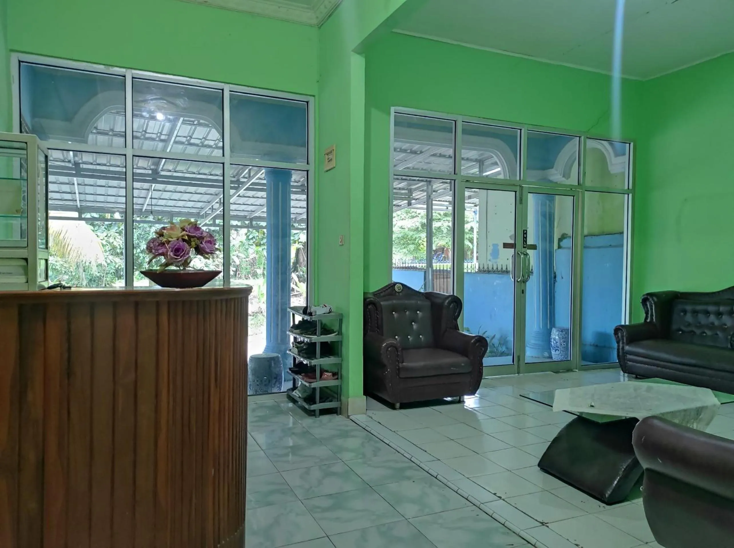 Lobby or reception in Hotel O Penginapan Syariah Al Syifa